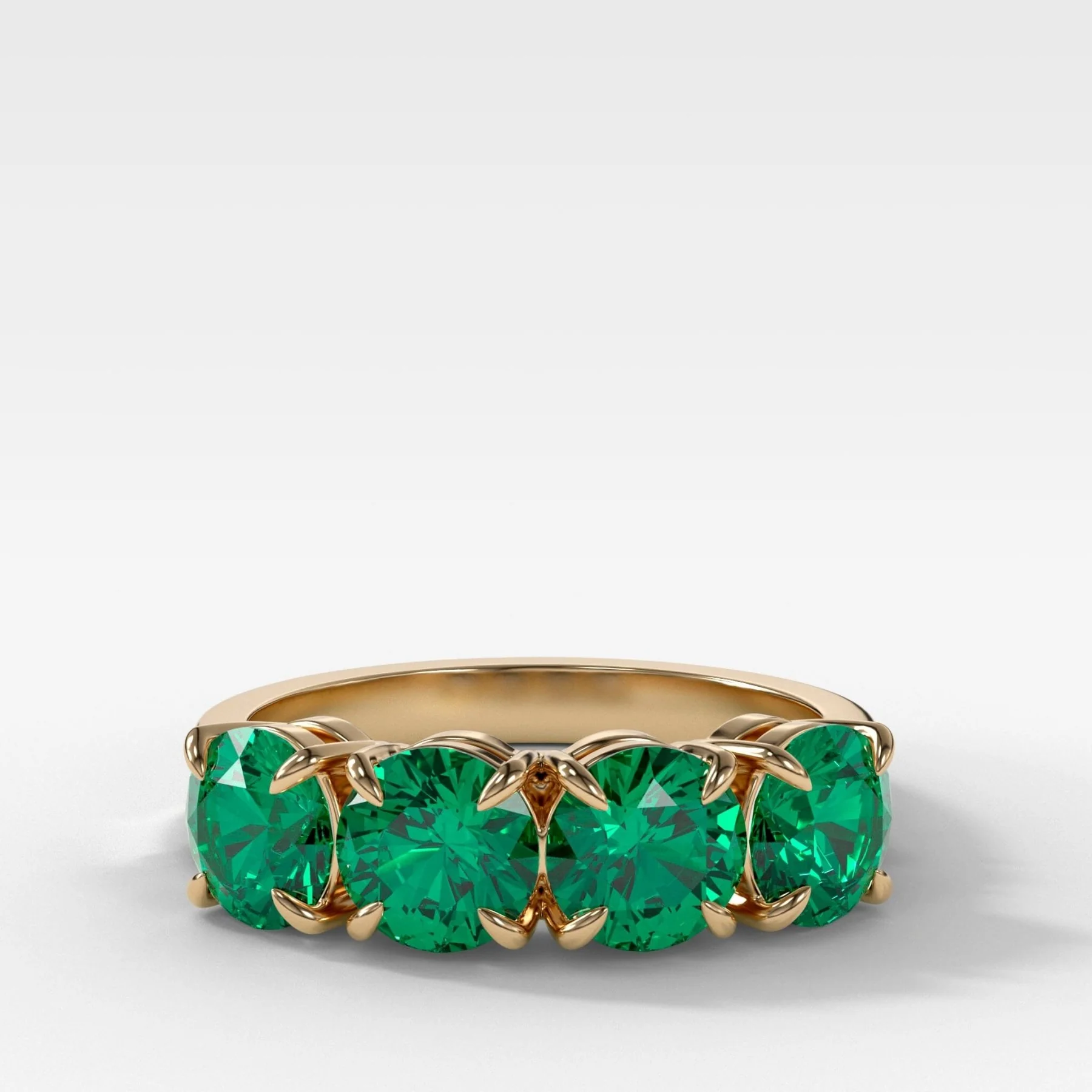 Four Stone Wedding Band With Green Emeralds