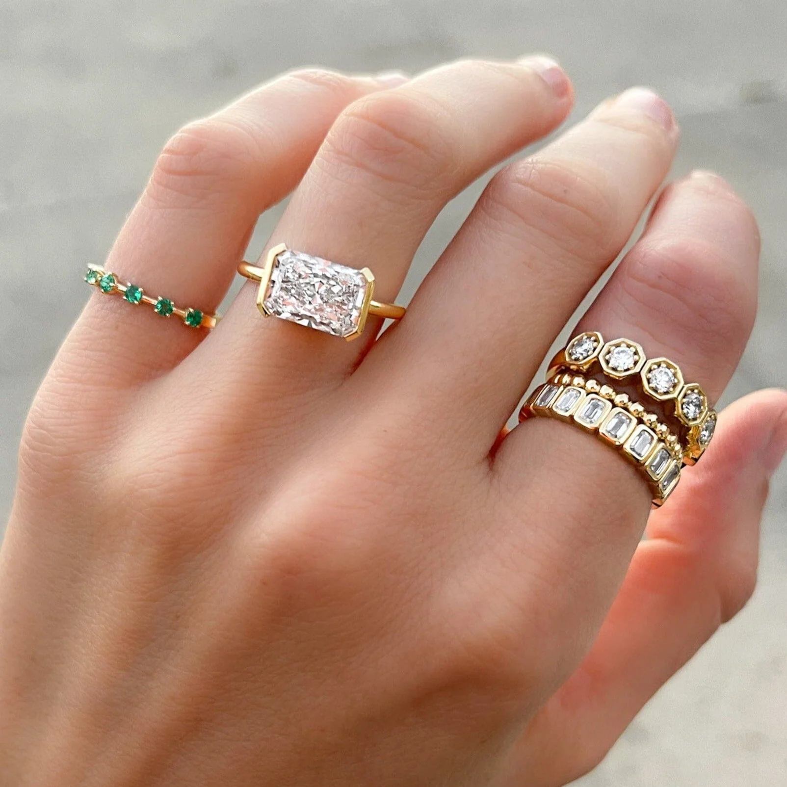 East West Half Bezel Solitaire Engagement Ring With Elongated Radiant Cut Diamond - Image 11