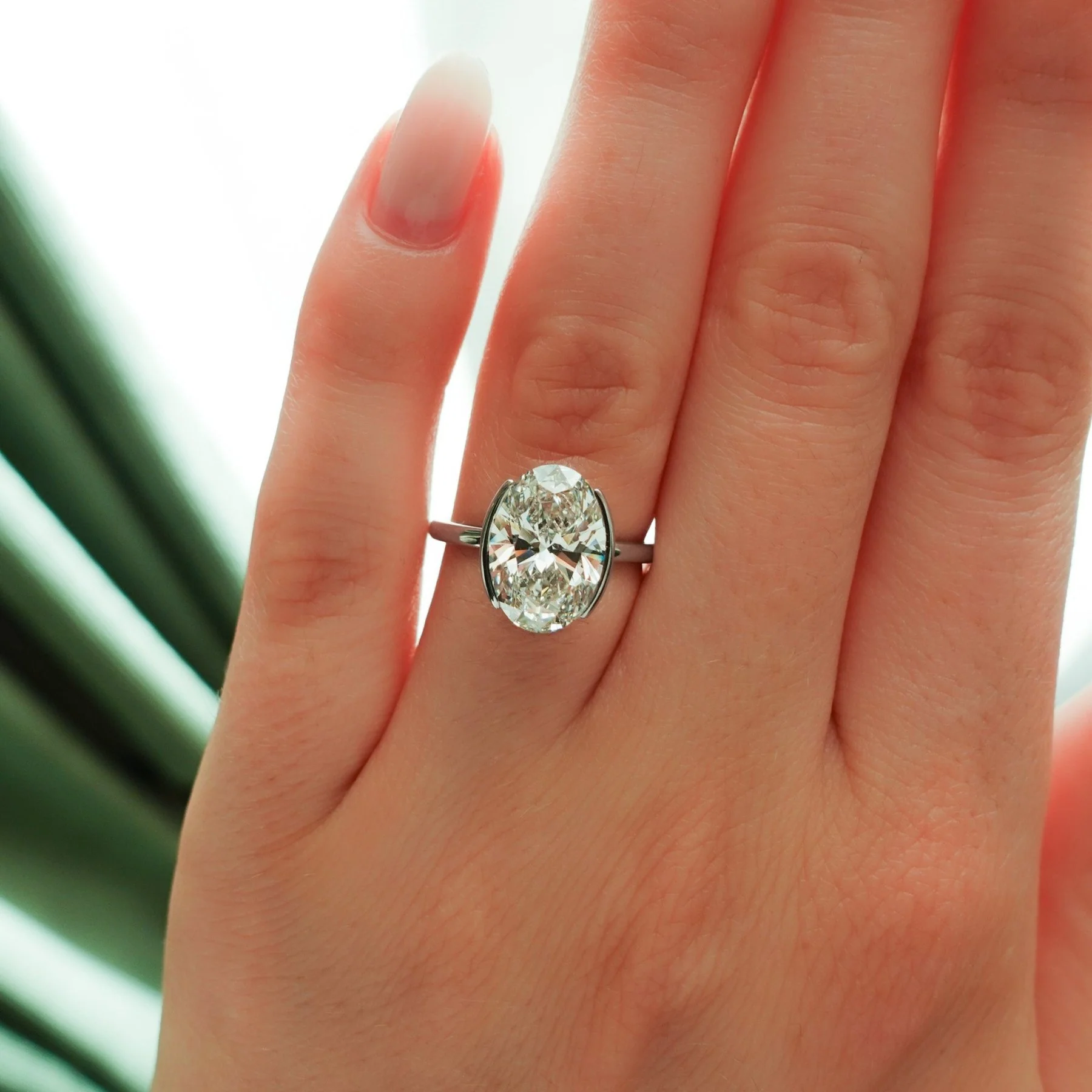 Half Bezel Solitaire Engagement Ring With Oval Cut Diamond - Image 3
