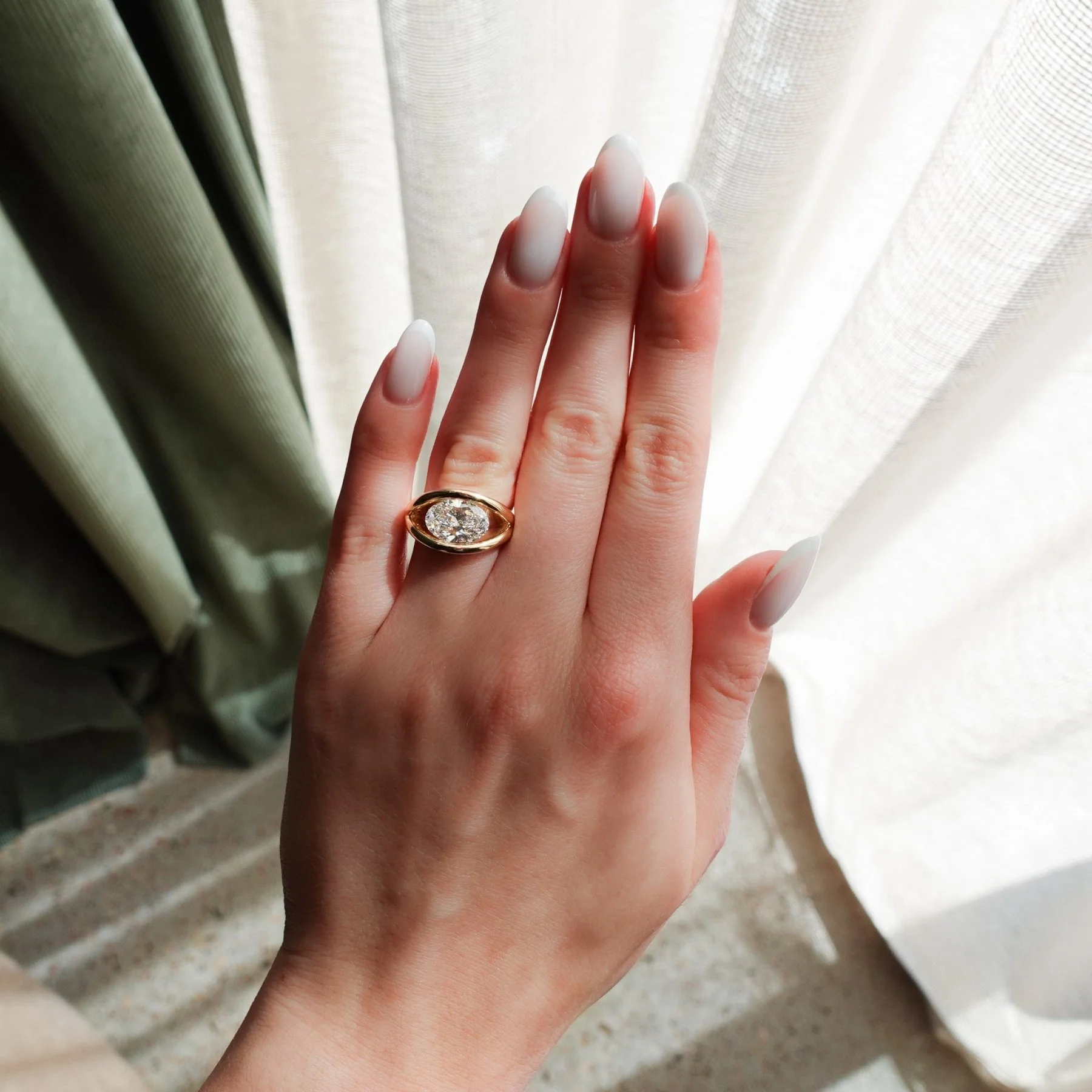 Iris Engagement Ring With an Oval Cut Diamond - Image 3