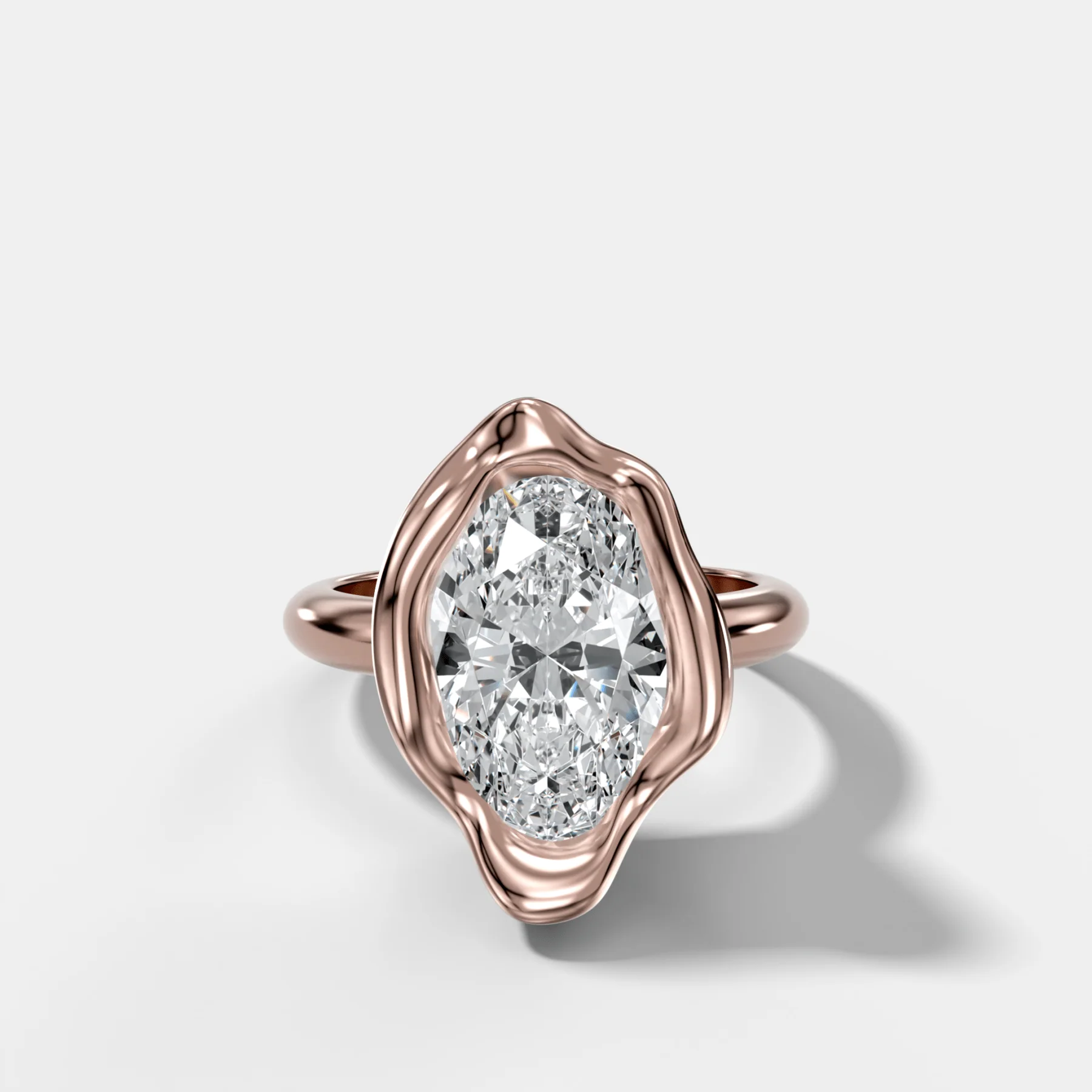 Molten Bezel Engagement Ring With an Oval Cut Diamond - Image 4