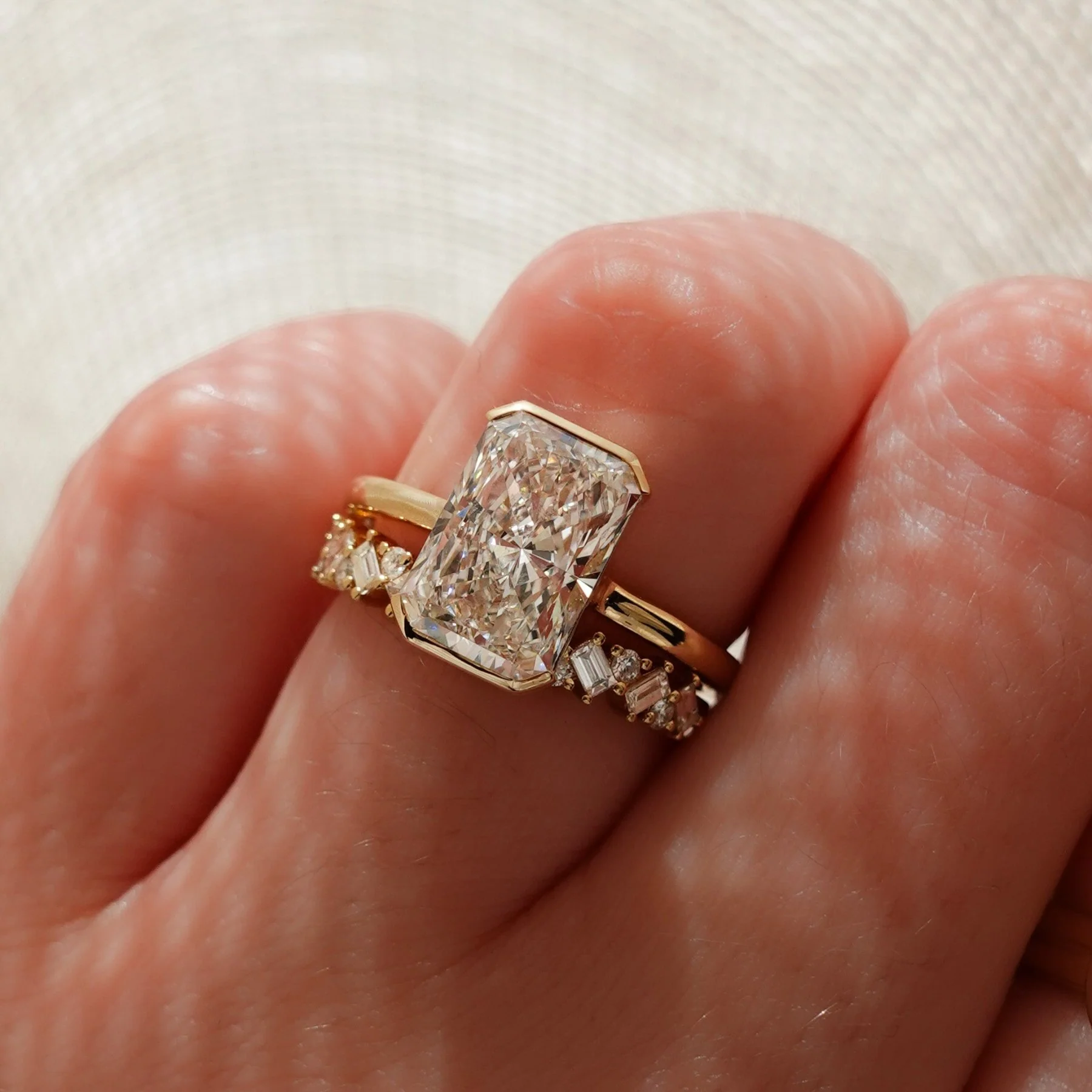 North South Half Bezel Solitaire Engagement Ring With Elongated Radiant Cut Diamond - Image 3