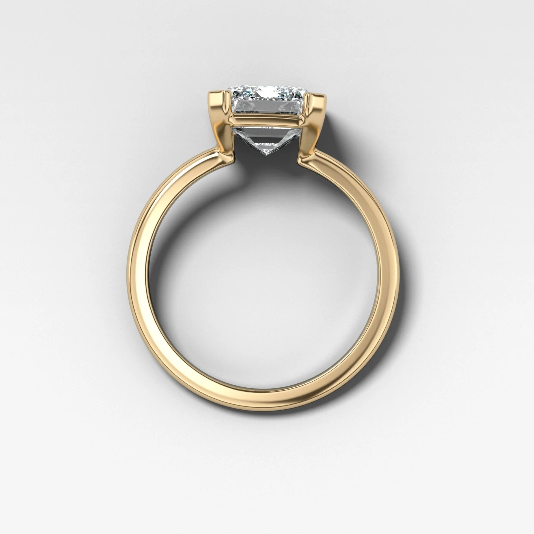 North South Half Bezel Solitaire Engagement Ring With Emerald Cut Diamond - Image 2