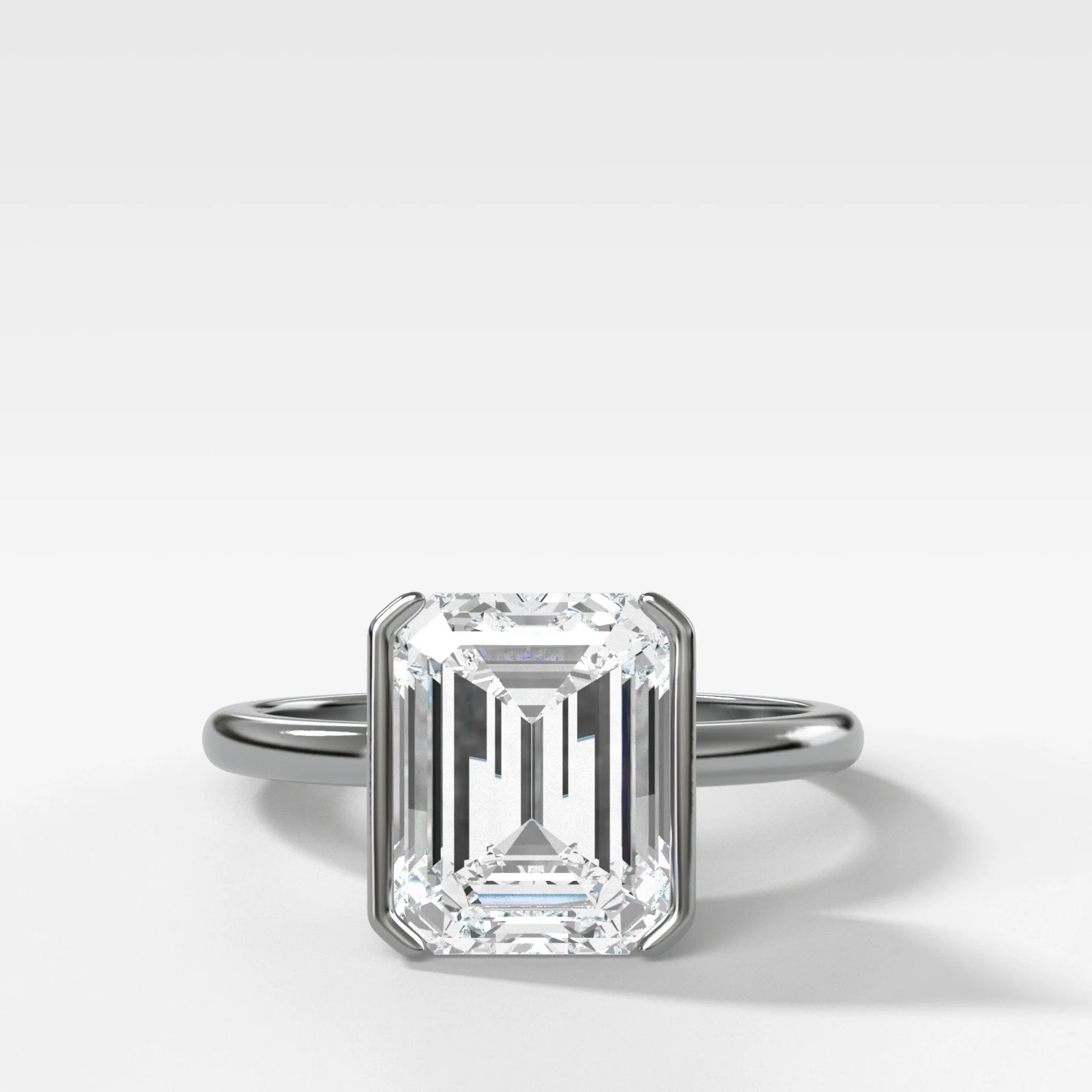 North South Half Bezel Solitaire Engagement Ring With Emerald Cut Diamond - Image 4