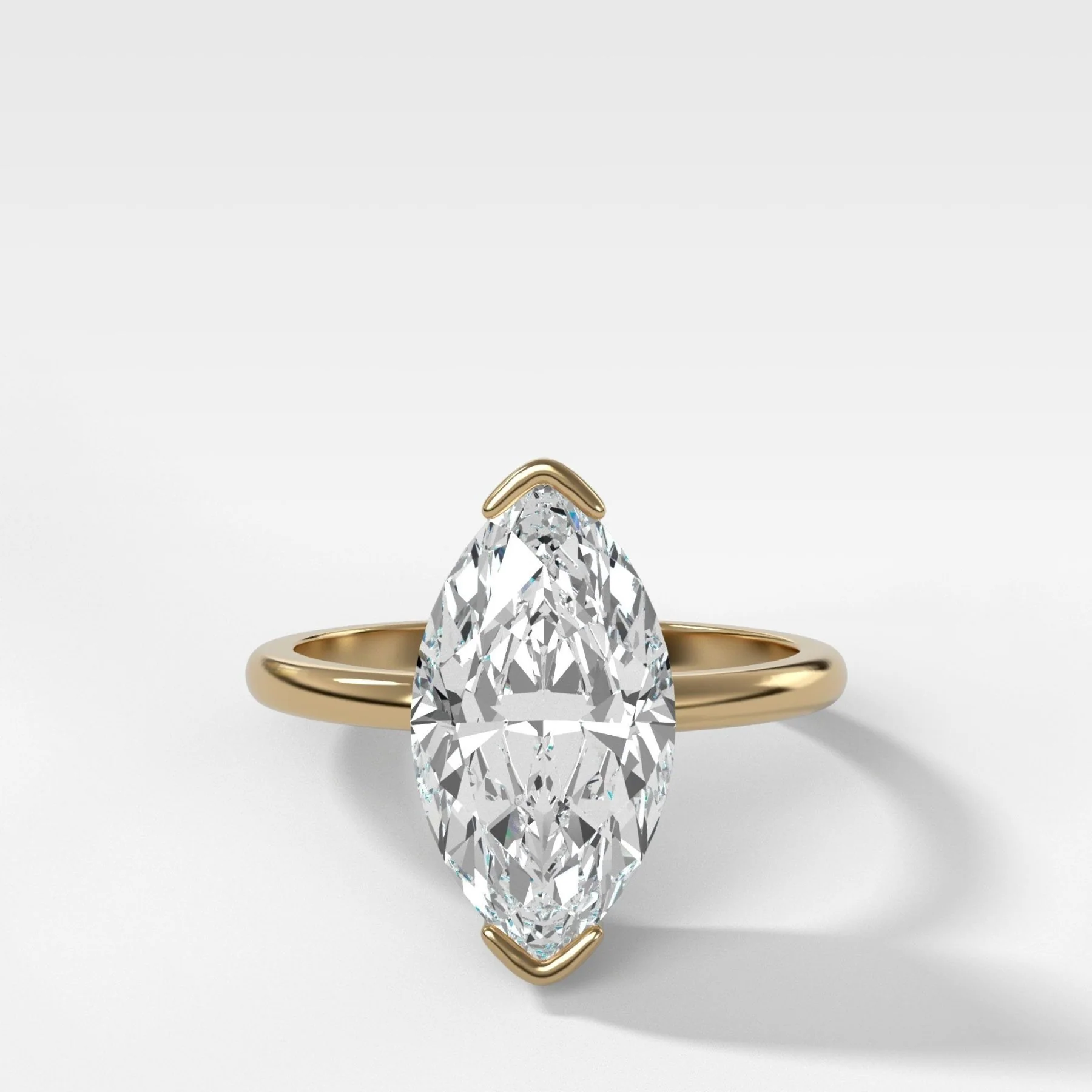 North South Half Bezel Solitaire Engagement Ring With Marquise Cut Diamond