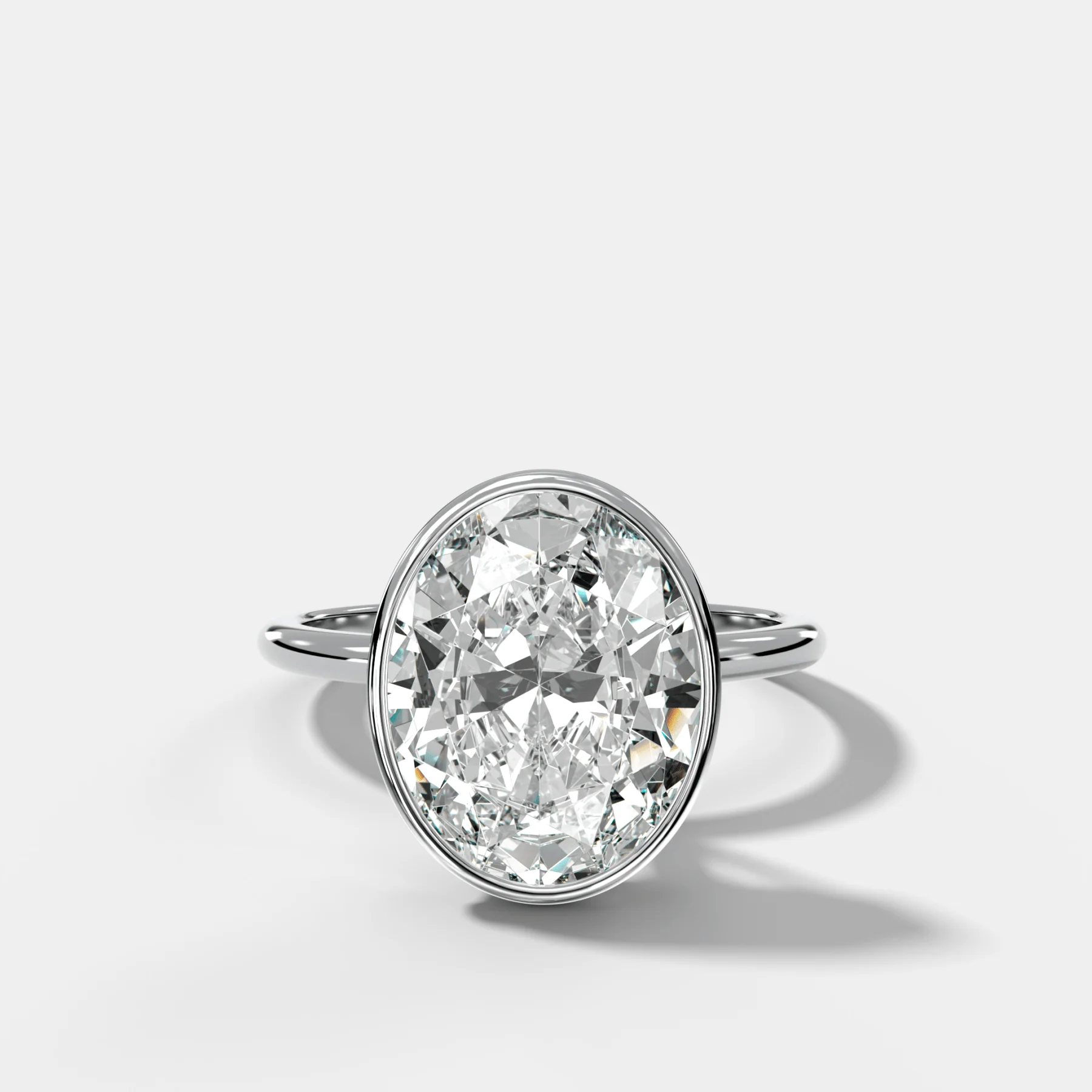 Penumbra Bezel Hidden Halo Engagement Ring with Oval Cut - Image 3