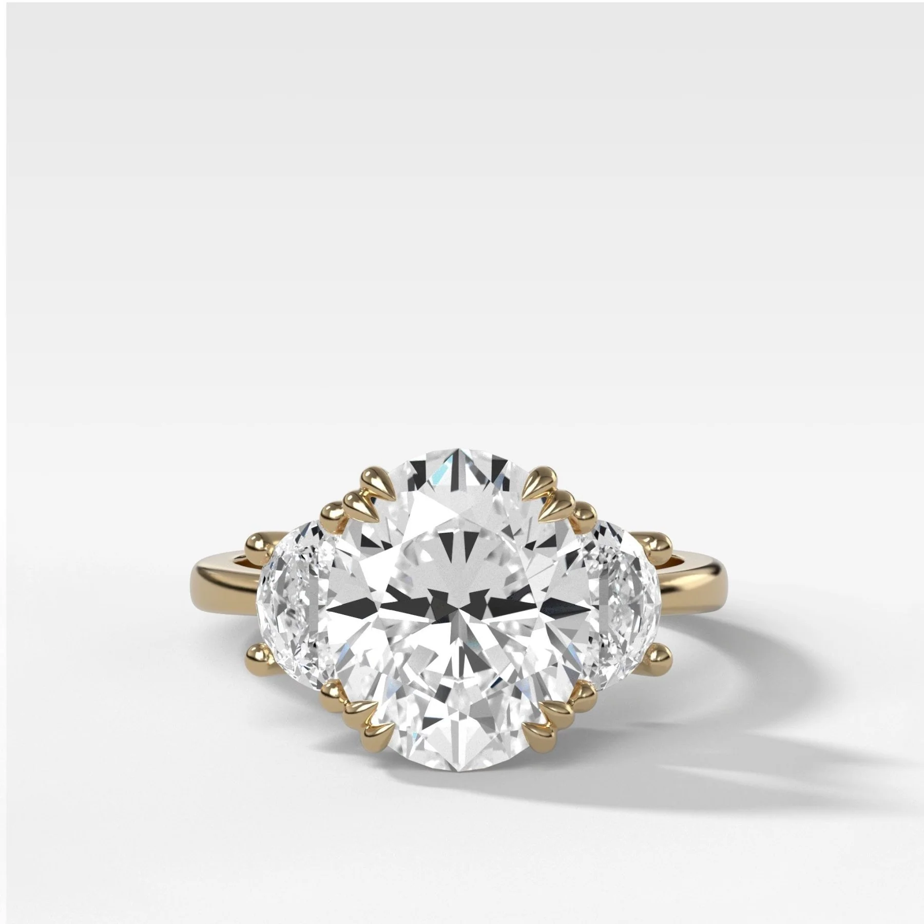 Oval Three Stone Engagement Ring With Half Moon Side Stones