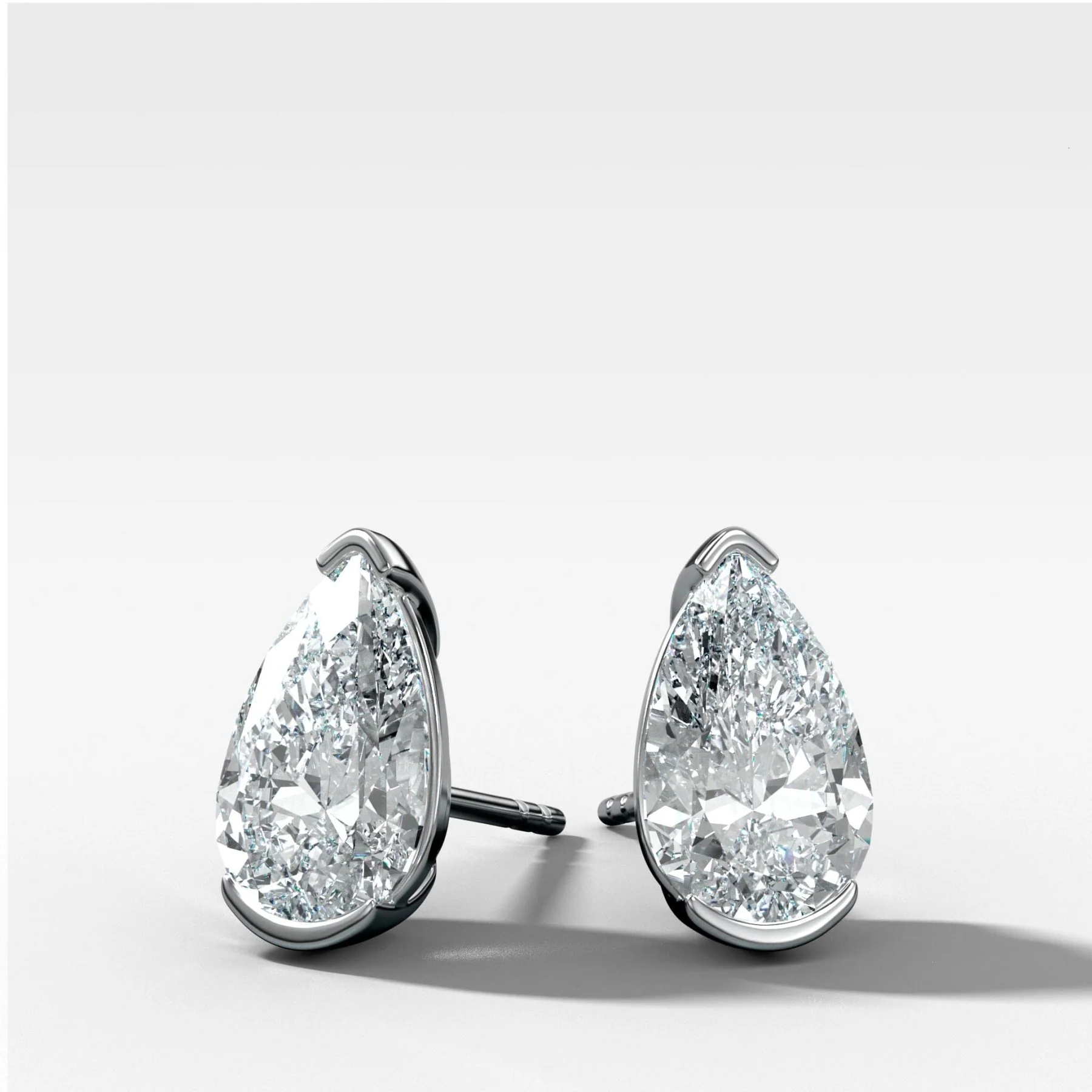 Pear Cut Half Bezel Diamond Studs - Image 2
