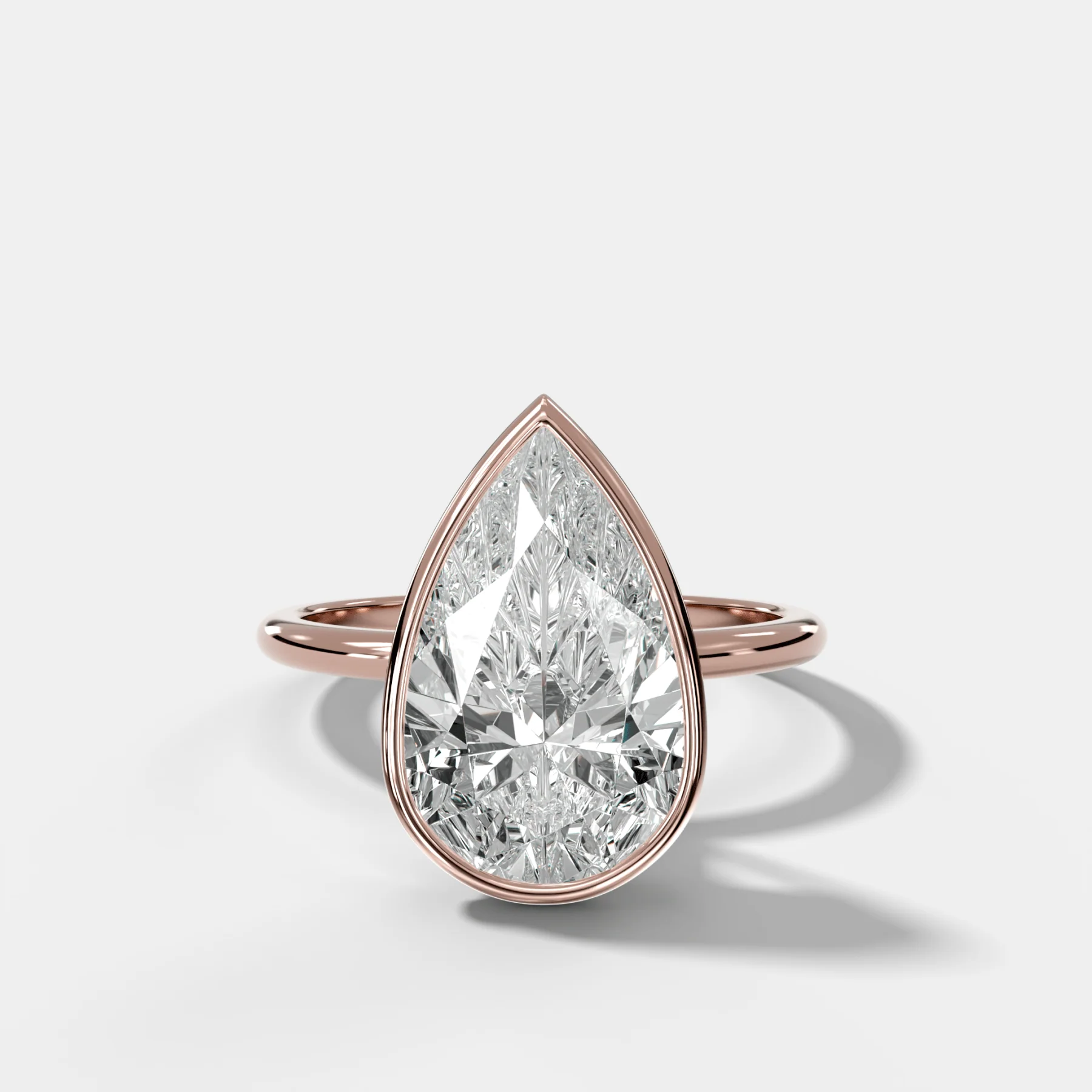 Penumbra Bezel Hidden Halo Engagement Ring with Pear Cut - Image 4
