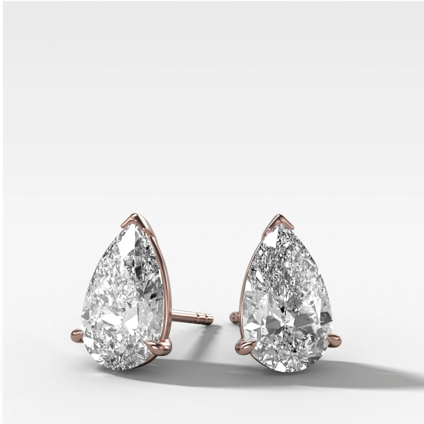 Pear Cut Single Point Prong Diamond Studs - Image 3