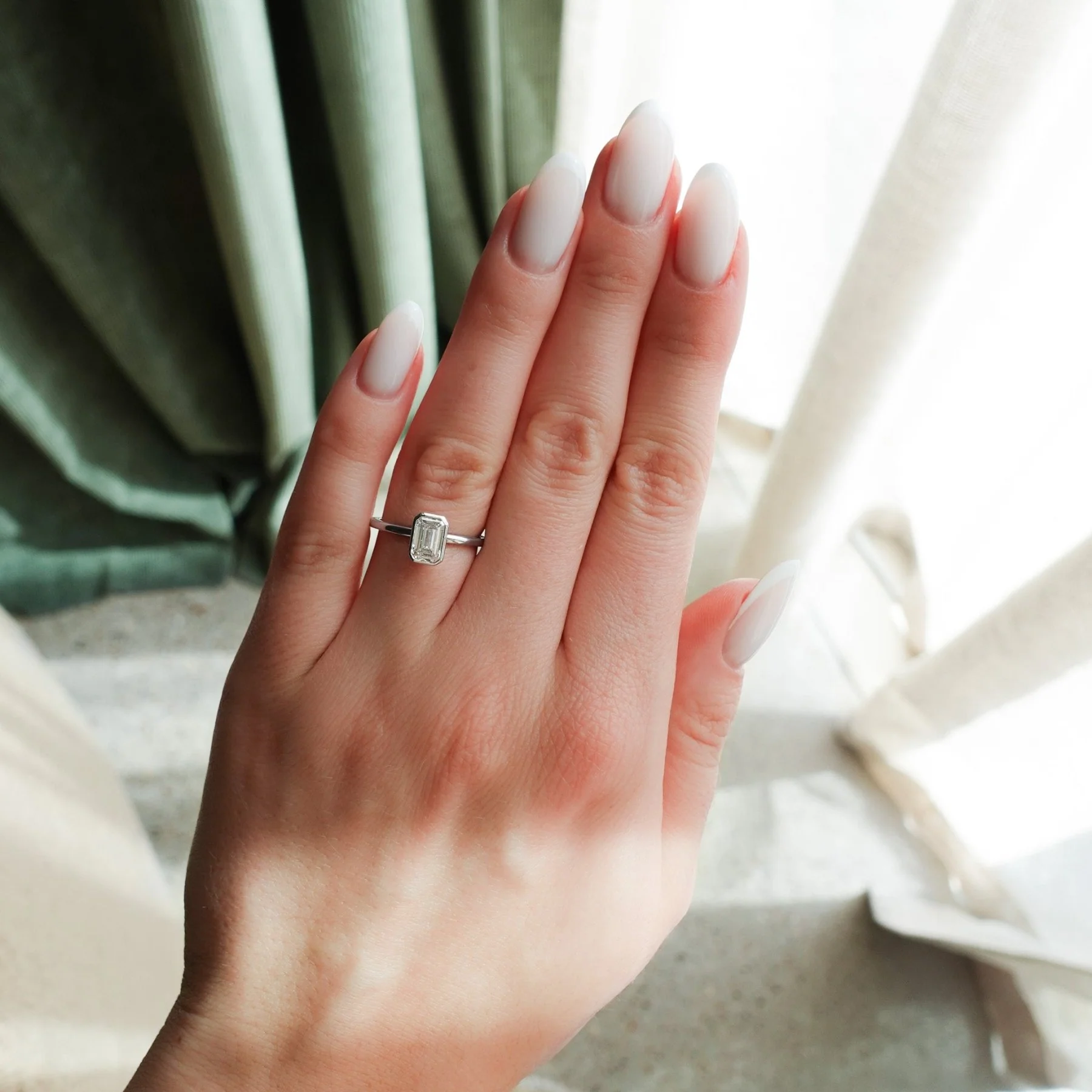 Penumbra Bezel Set Engagement Ring with 1.02ct Lab Grown Emerald Cut Diamond - Image 2