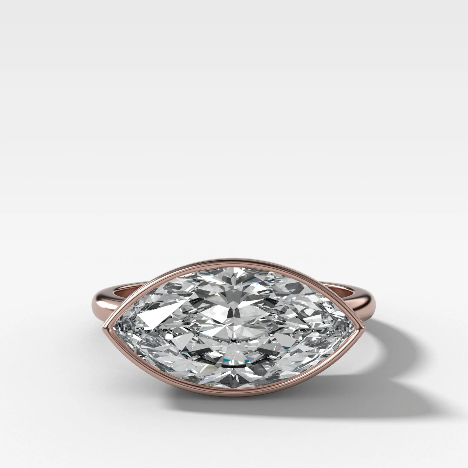 Penumbra Bezel Set Engagement Ring With East West Marquise Cut - Image 5