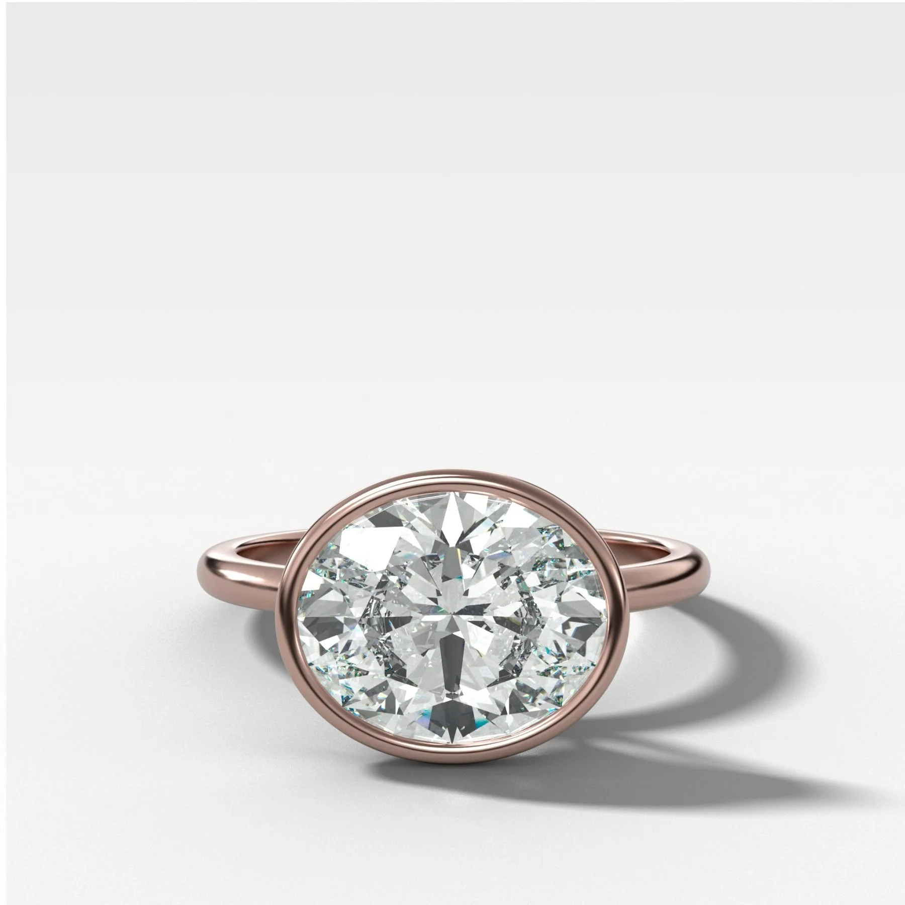 Penumbra Bezel Set Engagement Ring With East West Oval Cut - Image 5