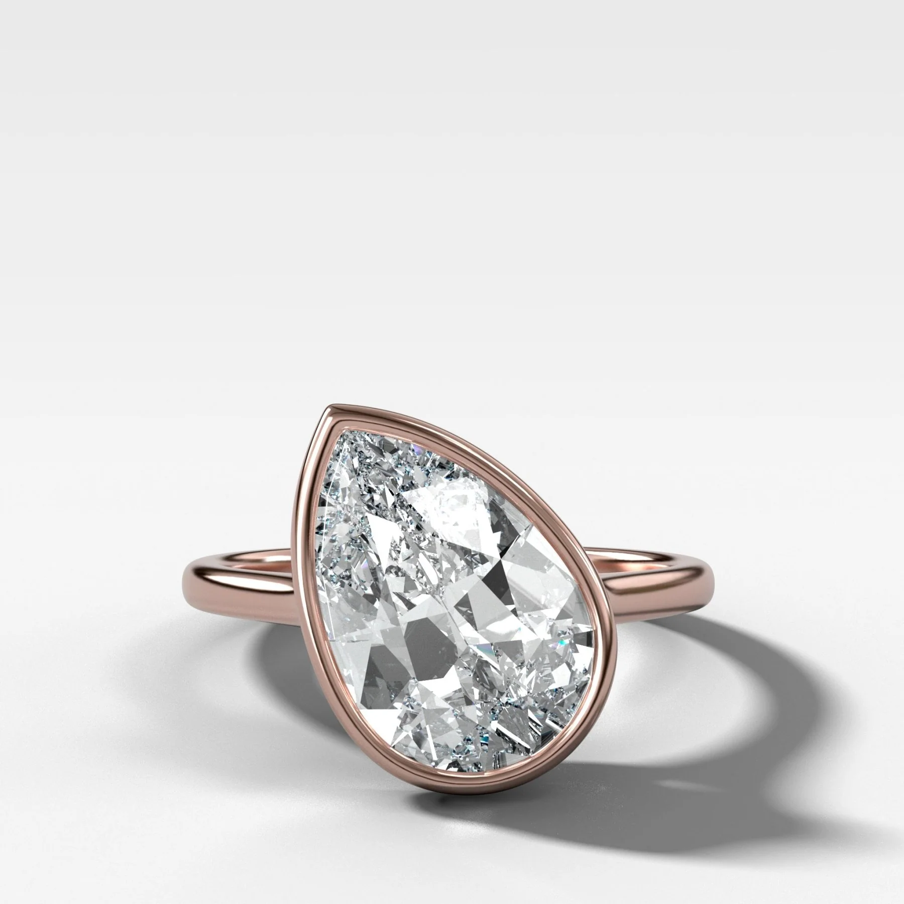 Penumbra Bezel Set Engagement Ring With Tilted Pear Cut - Image 5