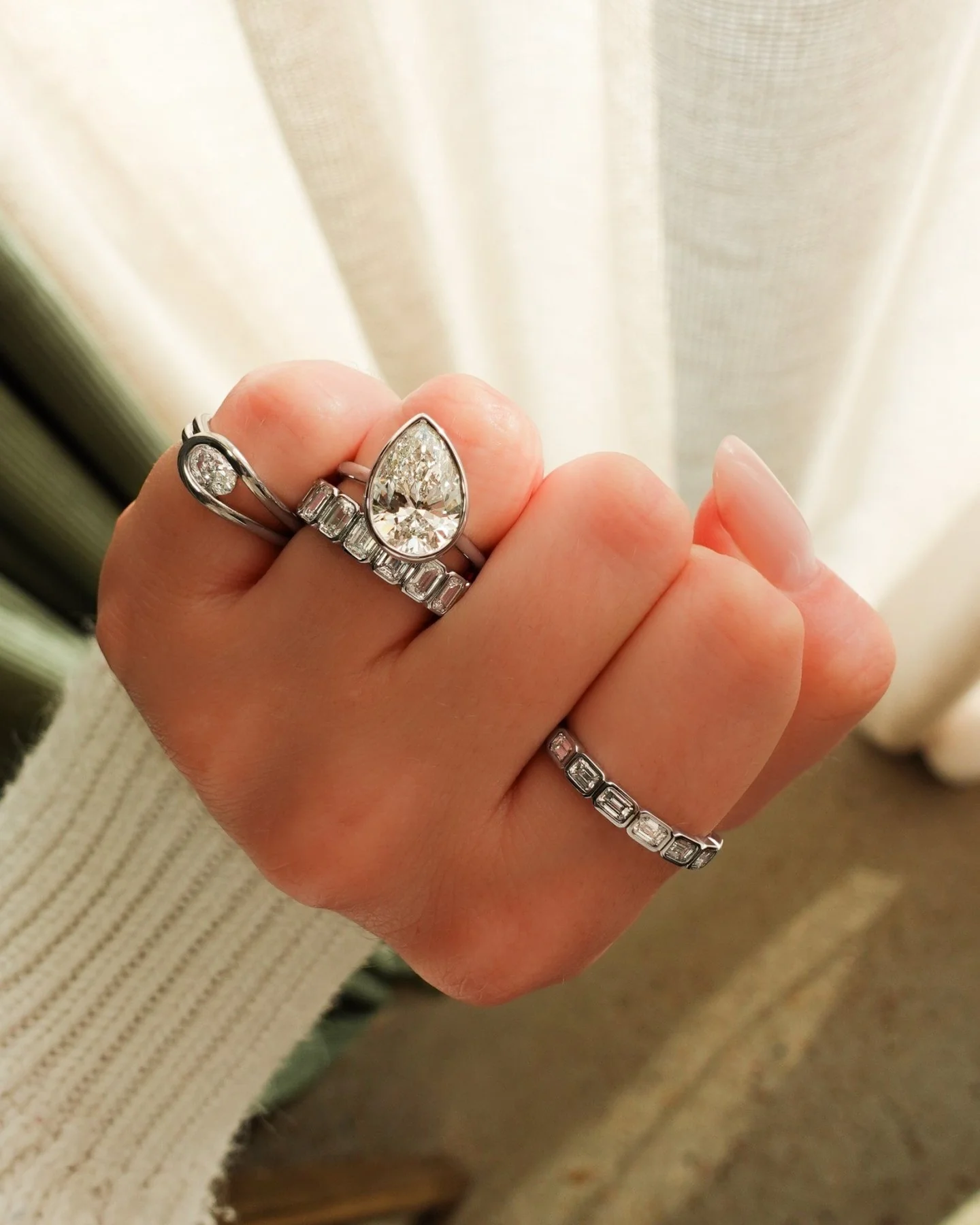 Penumbra Bezel Set Engagement Ring With Tilted Pear Cut - Image 6