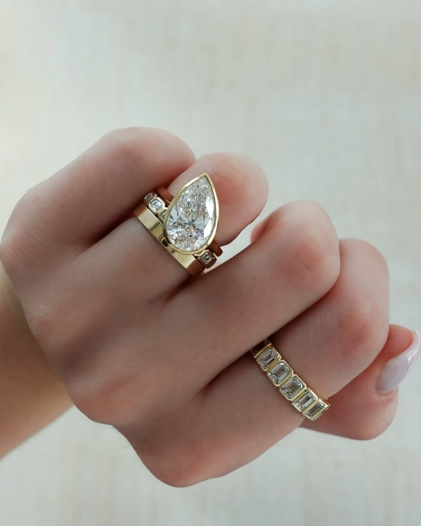 Penumbra Bezel Set Engagement Ring With Tilted Pear Cut - Image 7