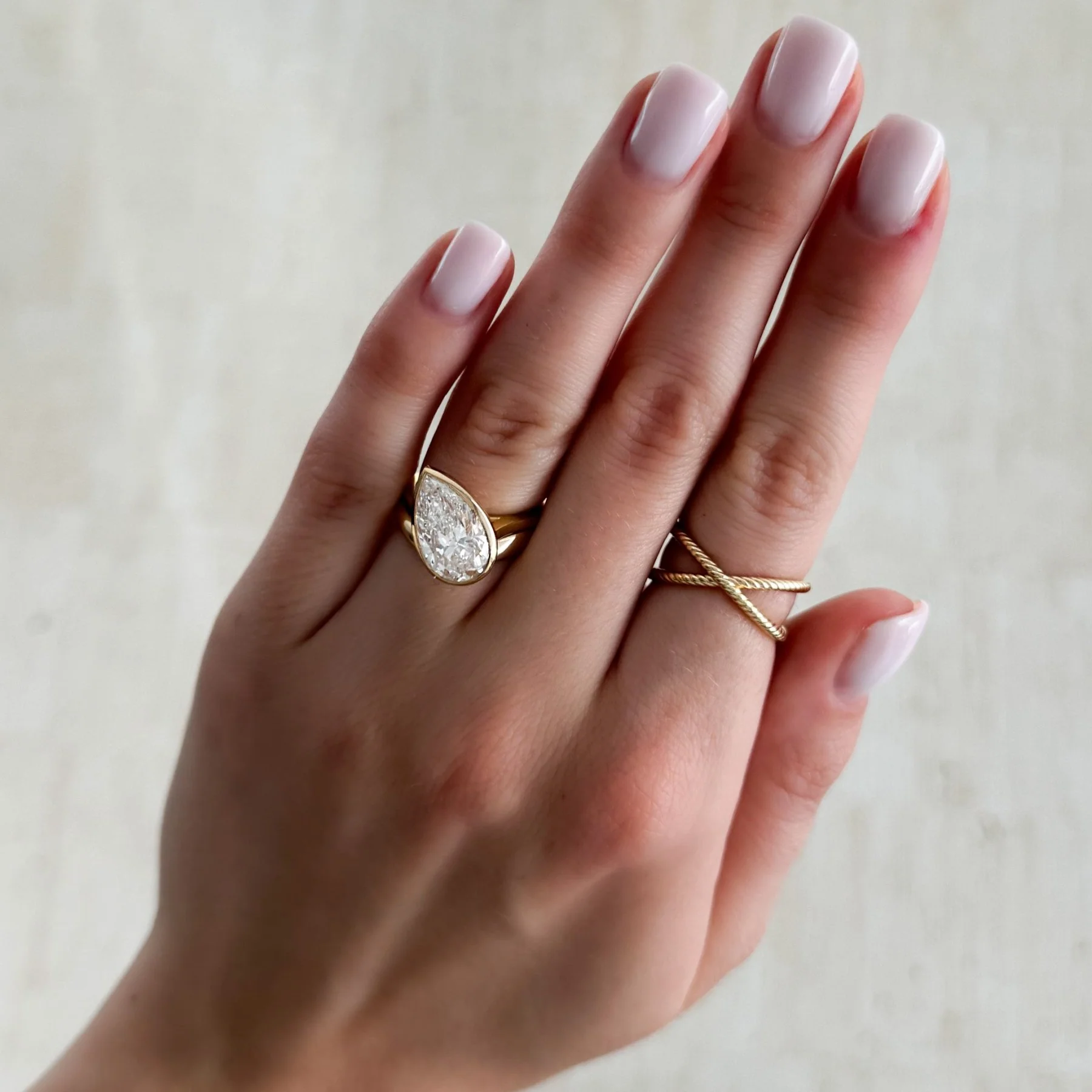 Penumbra Bezel Set Engagement Ring With Tilted Pear Cut - Image 8