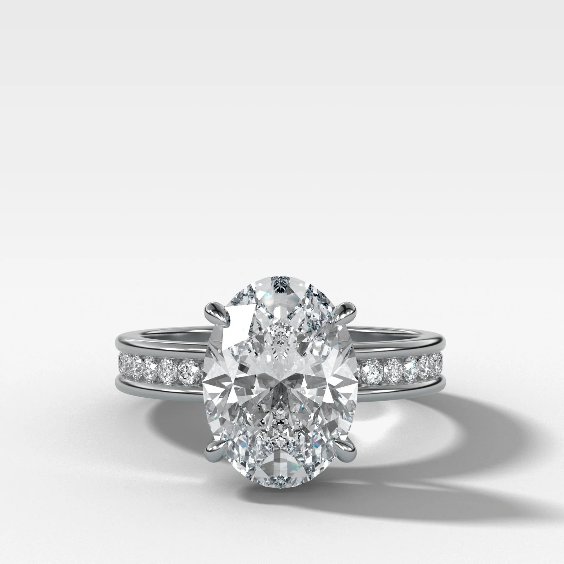 Petite Channel Set Engagement Ring with Oval Cut Diamond - Image 3