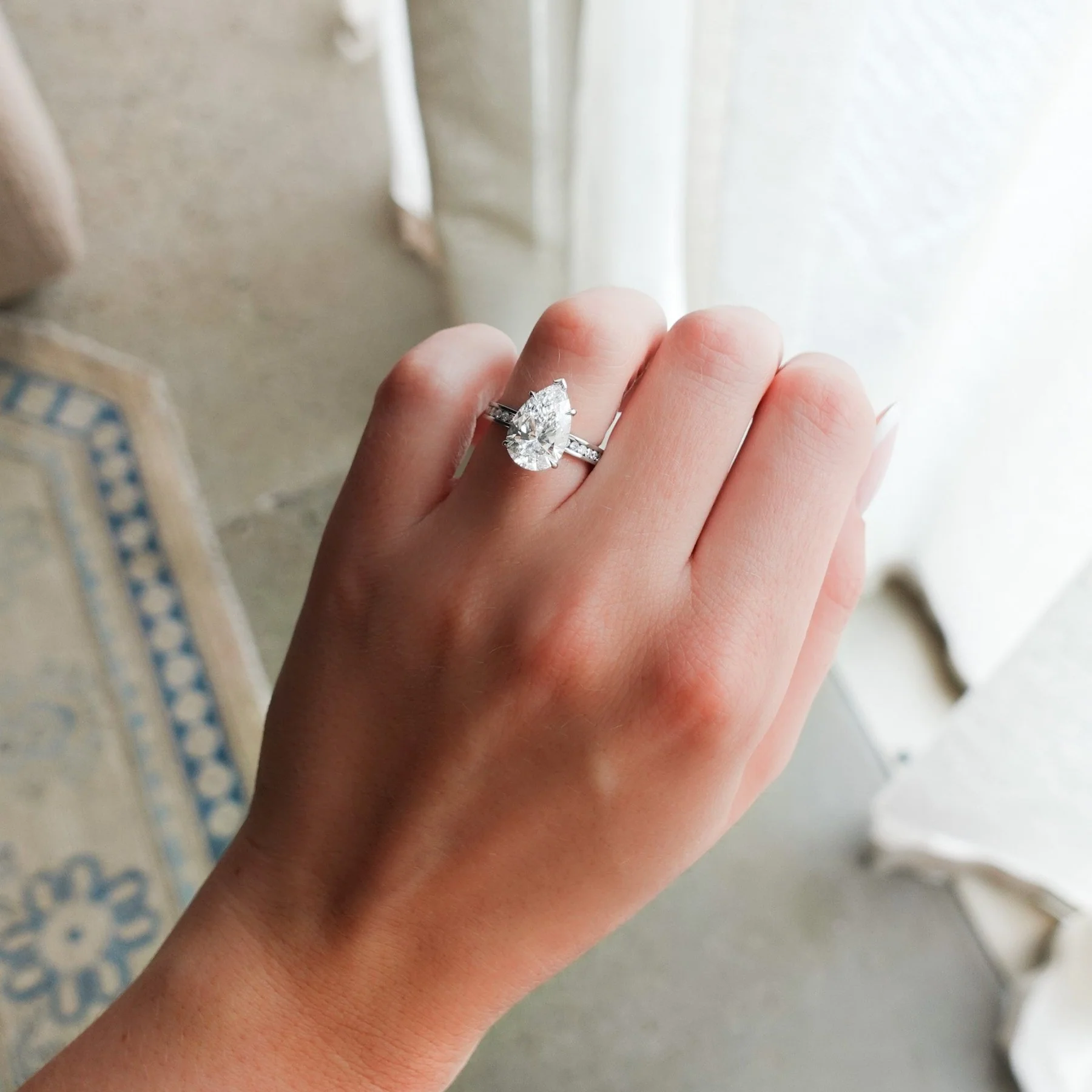 Petite Channel Set Engagement Ring with Pear Cut Diamond - Image 6