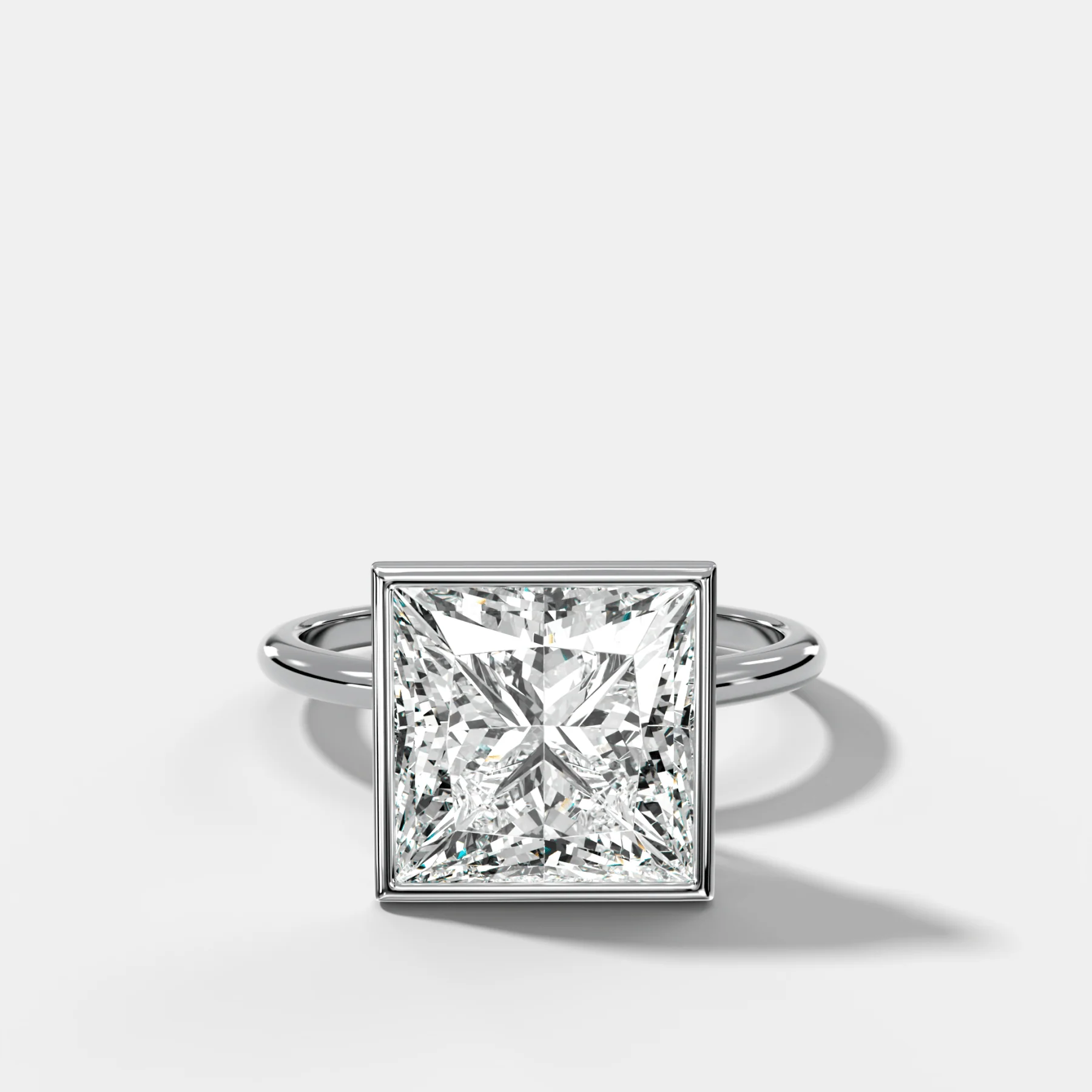Penumbra Bezel Hidden Halo Engagement Ring with Princess Cut - Image 3
