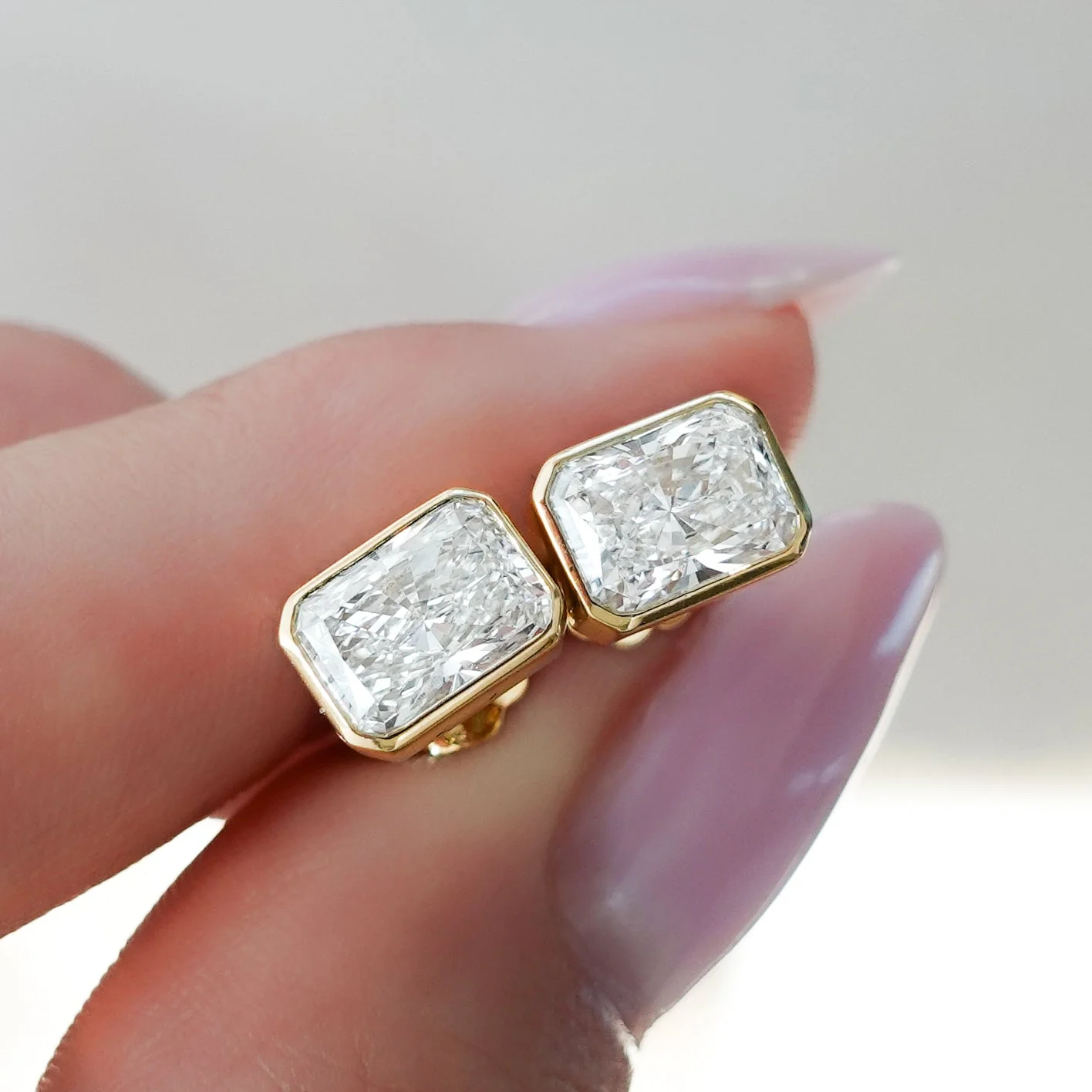 Bezel Set Elongated Radiant Diamond Studs - Image 2