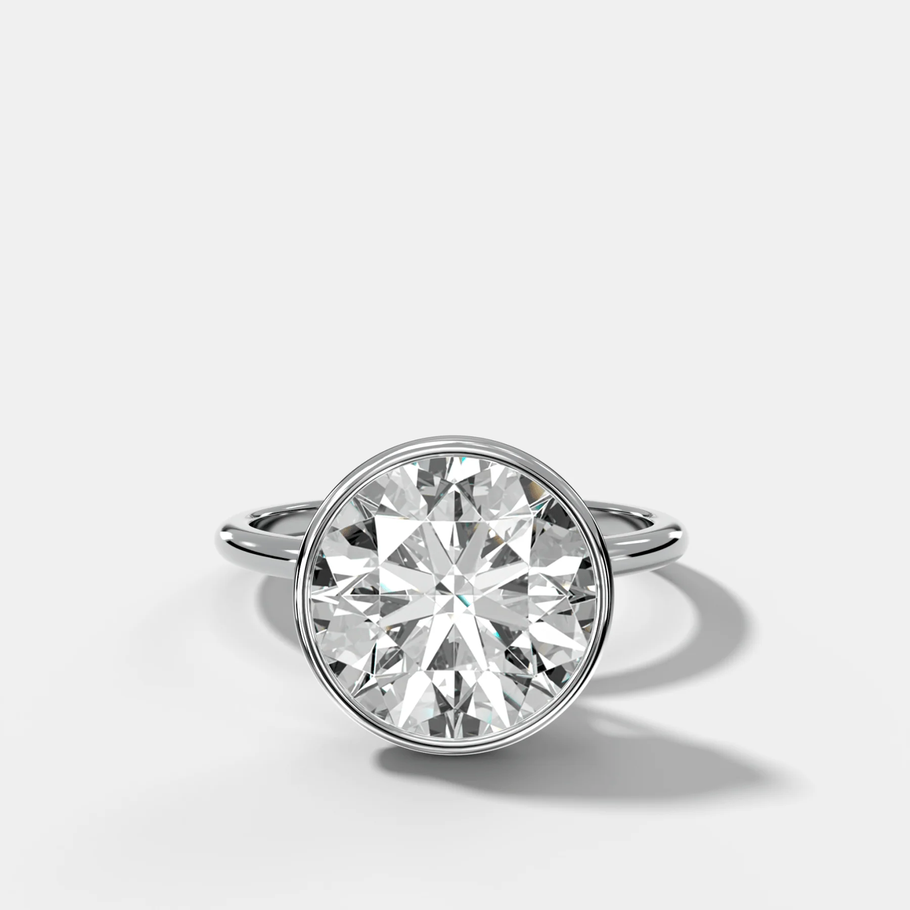 Penumbra Bezel Hidden Halo Engagement Ring with Round Cut - Image 3