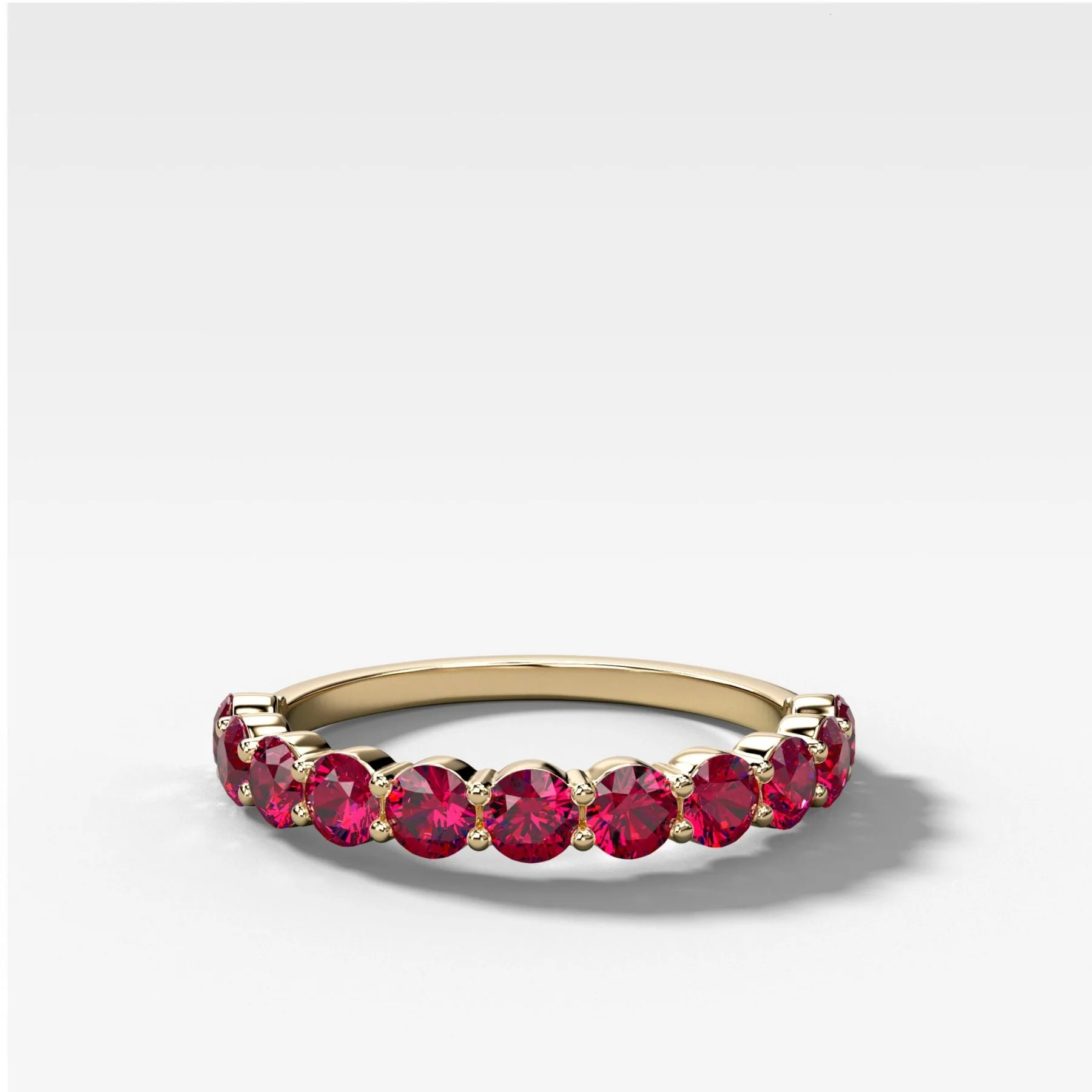 Shared Prong Wedding Band With Red Ruby Rounds