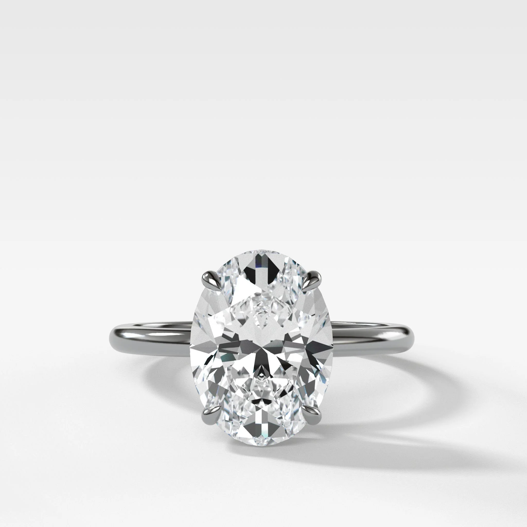 Thin + Simple Solitaire Engagement Ring With Oval Cut Diamond - Image 6