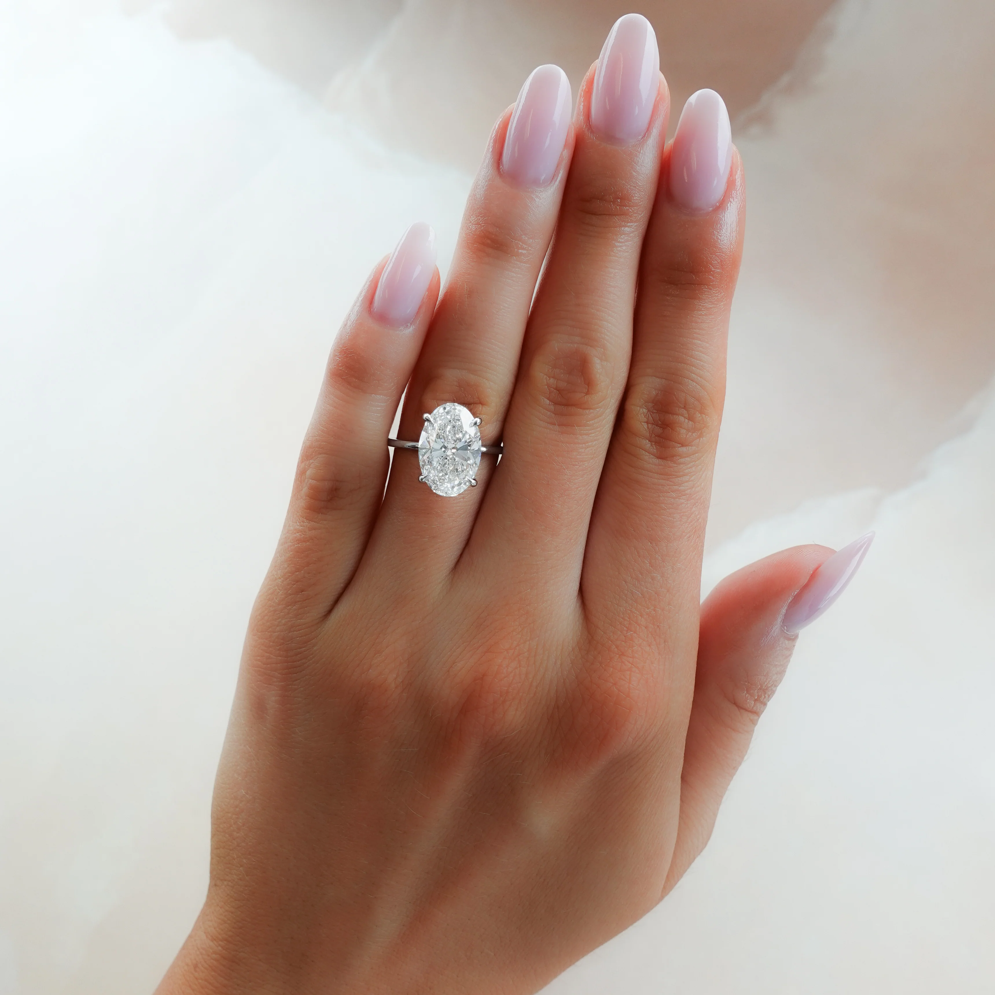 Thin + Simple Solitaire Engagement Ring With Oval Cut Diamond - Image 7