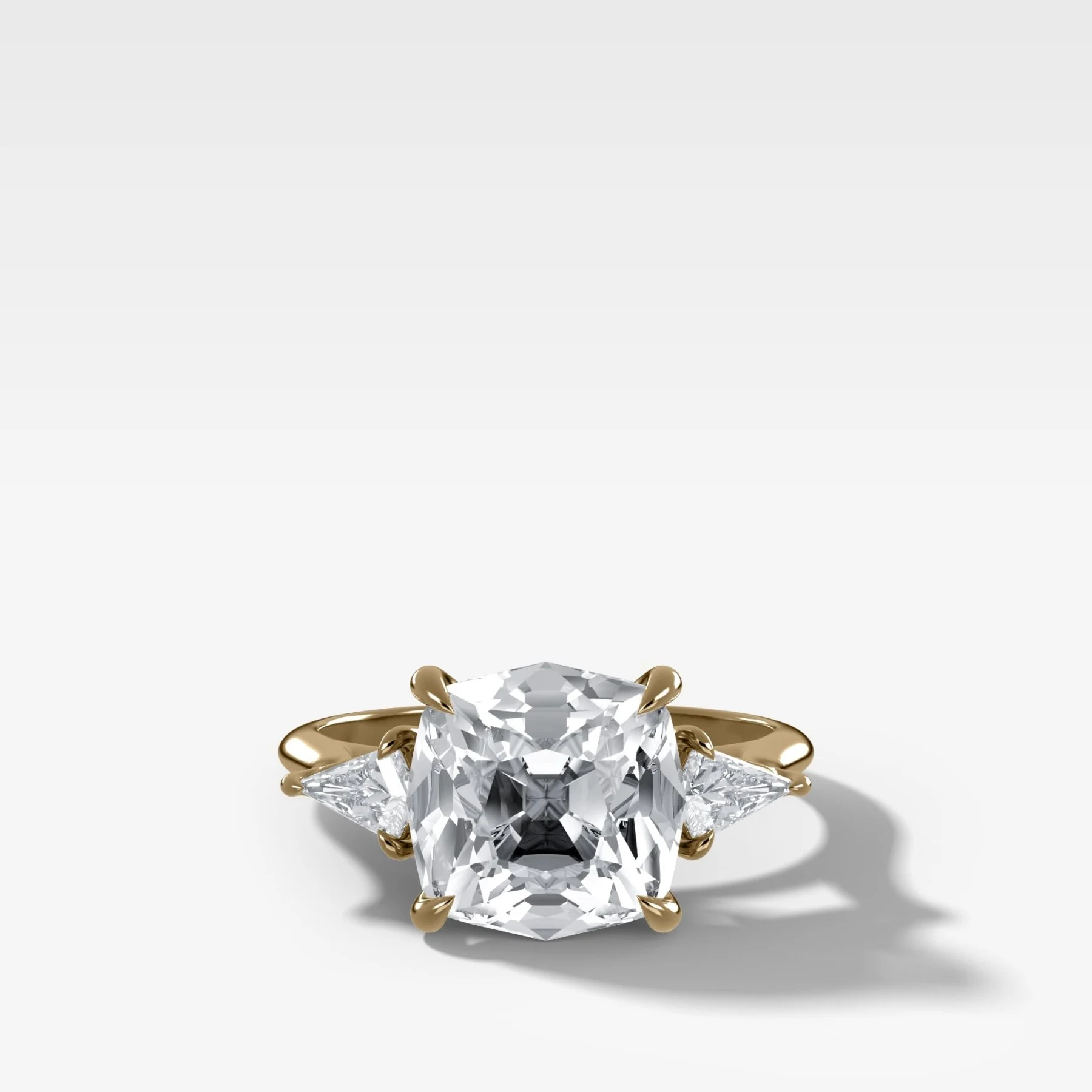 Three Stone Engagement Ring With Kite Side Stones and Old Mine Cut Diamond