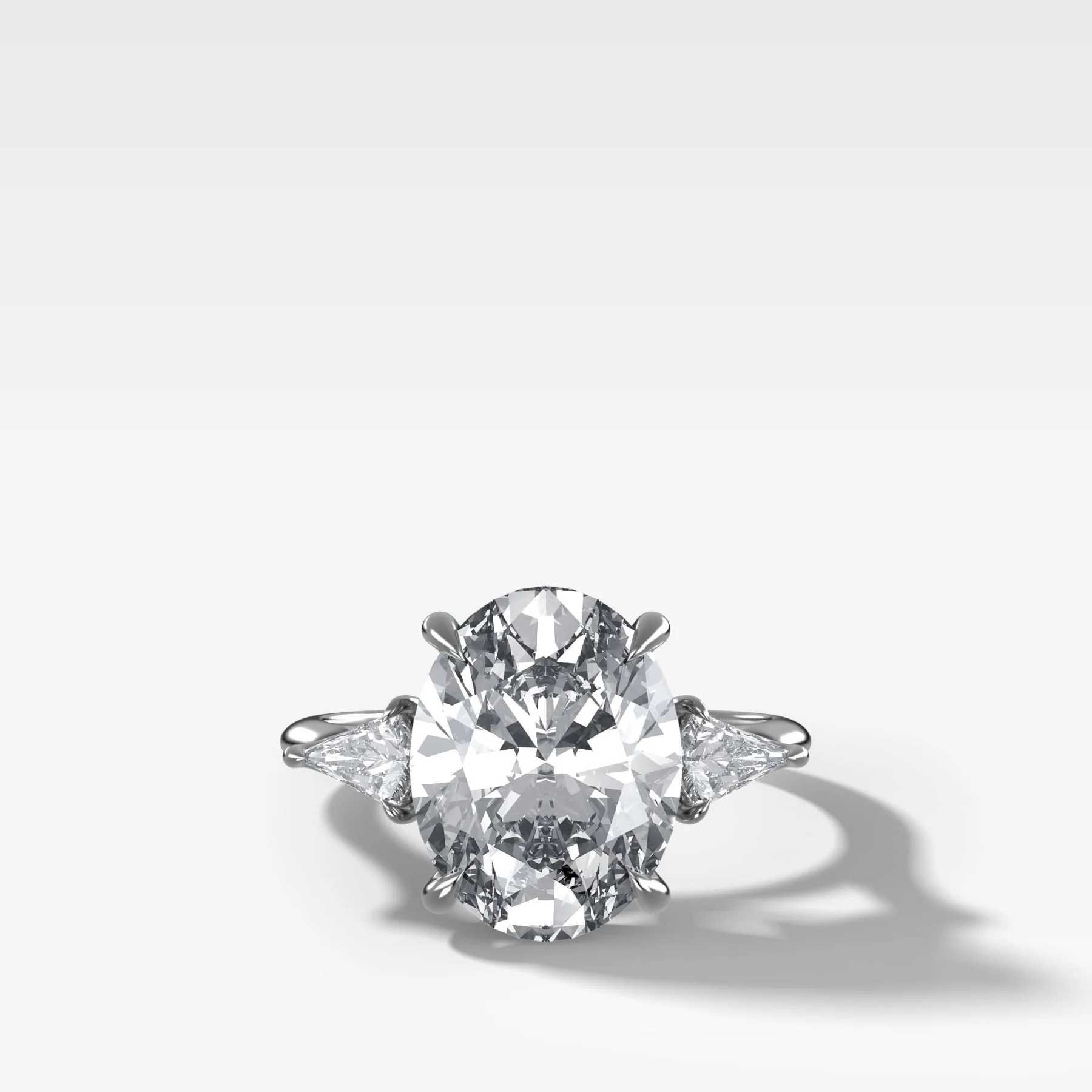 Three Stone Engagement Ring With Kite Side Stones and Oval Cut Diamond - Image 3