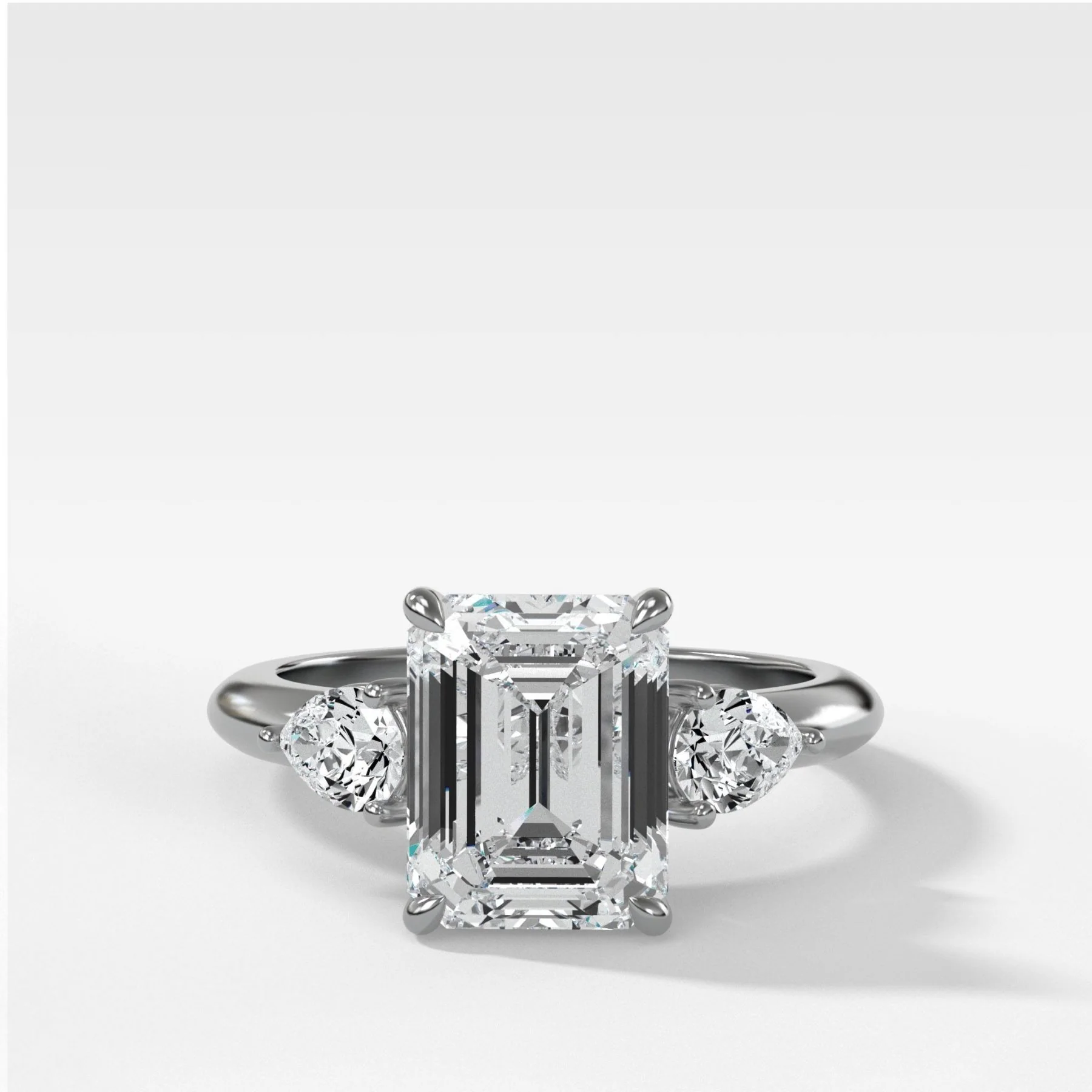 Three Stone Engagement Ring With Pear Side Stones and Emerald Cut Diamond - Image 4