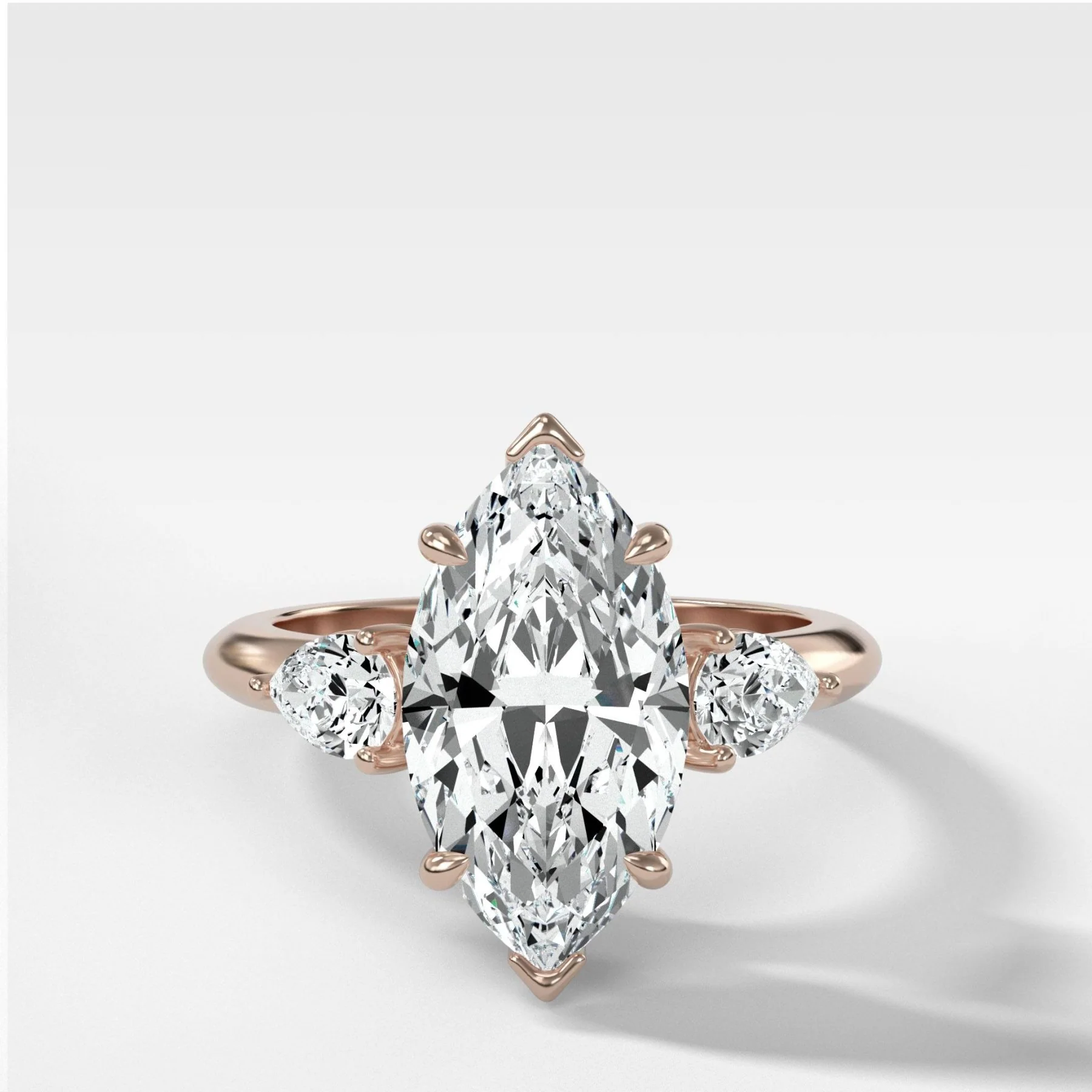 Three Stone Engagement Ring With Pear Side Stones and Marquise Cut Diamond - Image 5