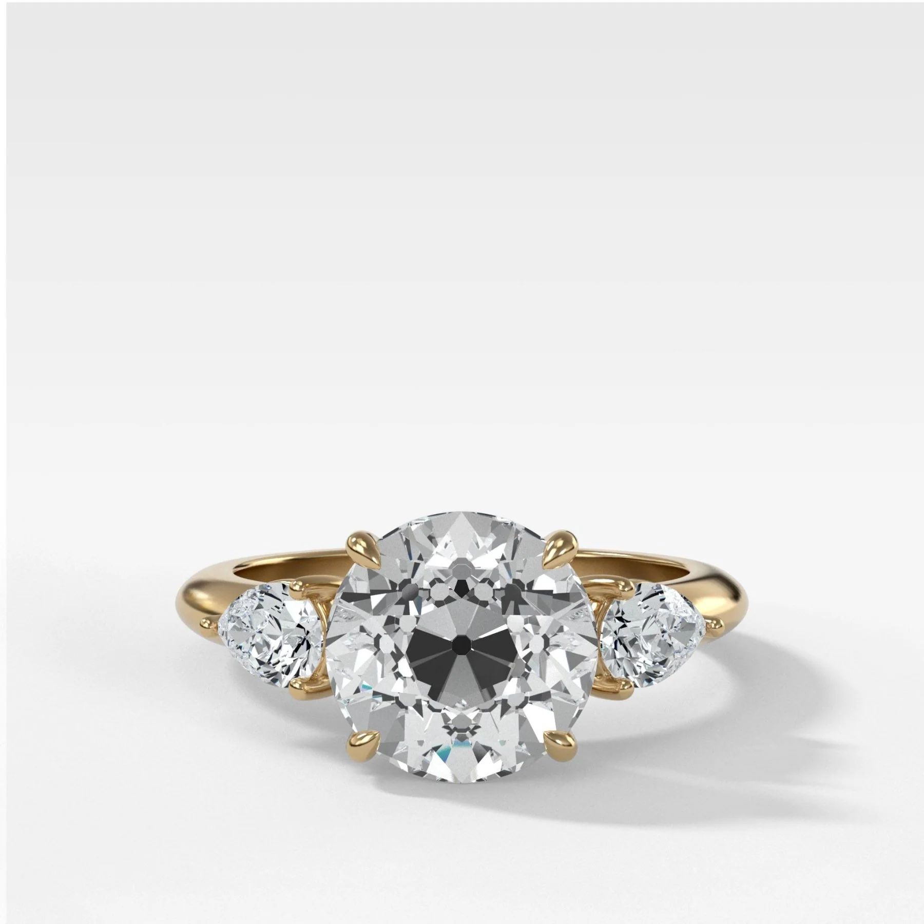 Three Stone Engagement Ring With Pear Side Stones and Old Euro Cut Diamond