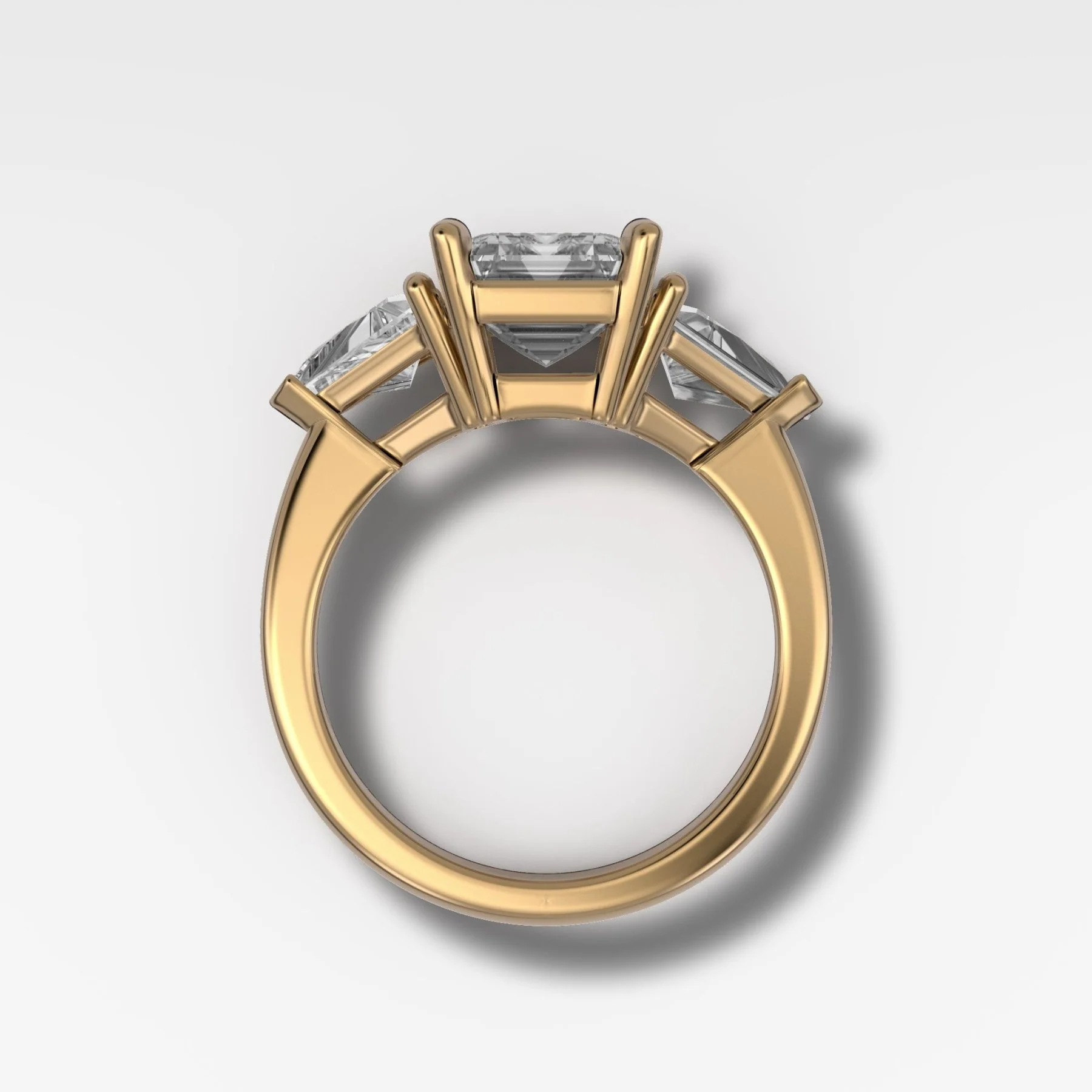 Three Stone Engagement Ring with Shield Side Stones and an Emerald Cut Diamond - Image 2