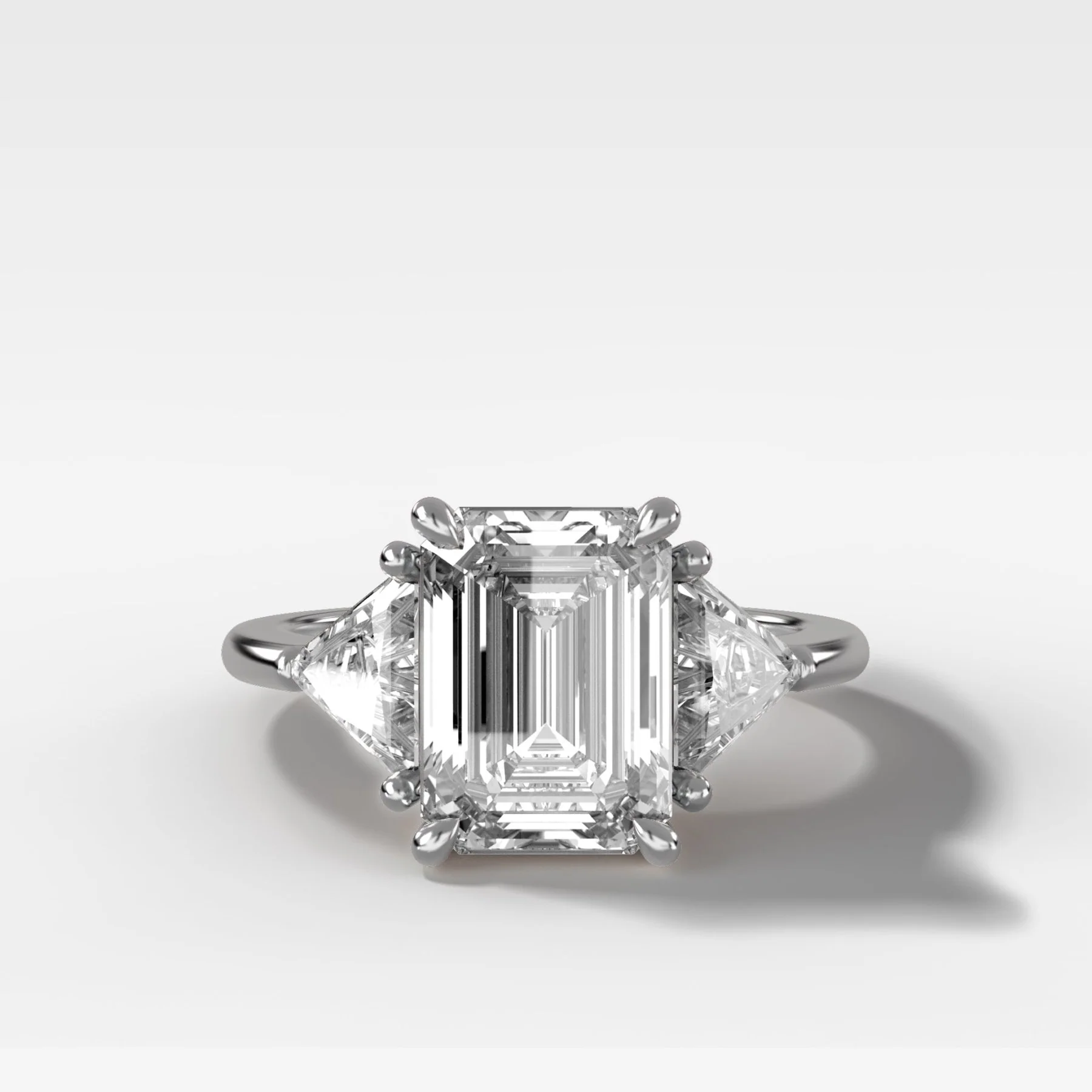 Three Stone Engagement Ring with Shield Side Stones and an Emerald Cut Diamond - Image 4