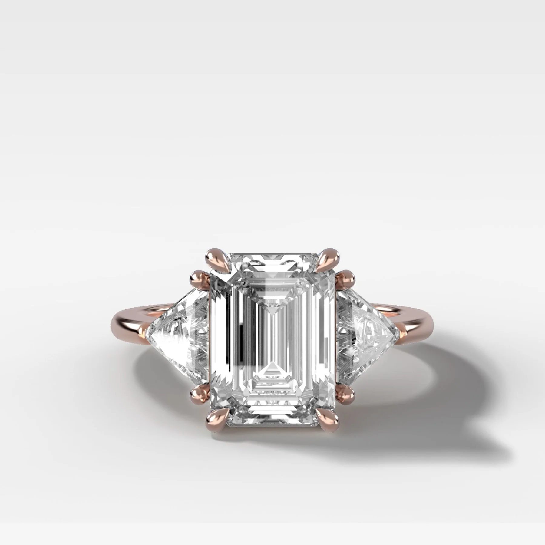 Three Stone Engagement Ring with Shield Side Stones and an Emerald Cut Diamond - Image 5