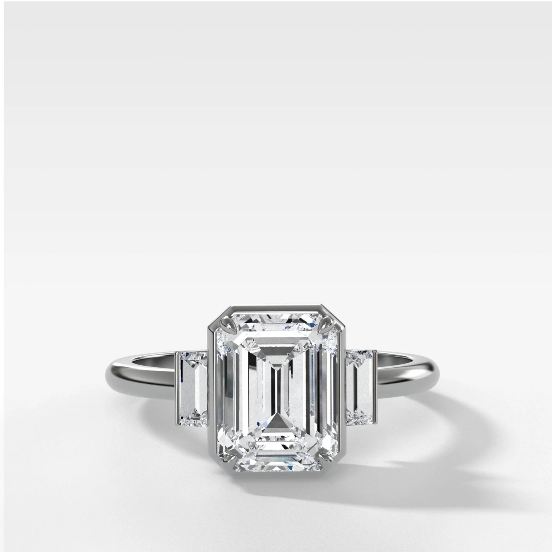Three Stone Engagement Ring With Straight Baguette Side Stones and Emerald Cut Diamond - Image 3