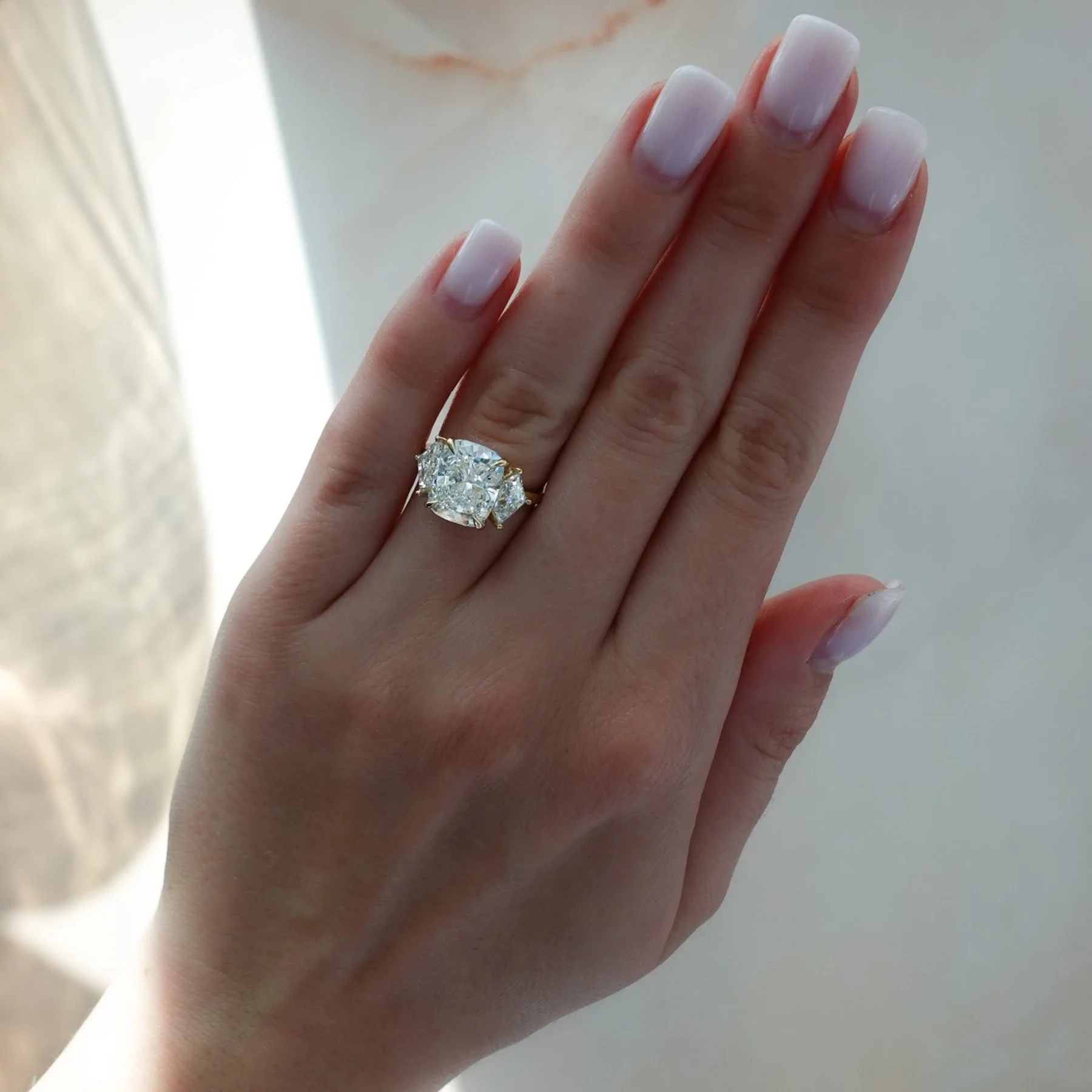 Three Stone Engagement Ring with Shield Side Stones and an Elongated Cushion cut Diamond - Image 2