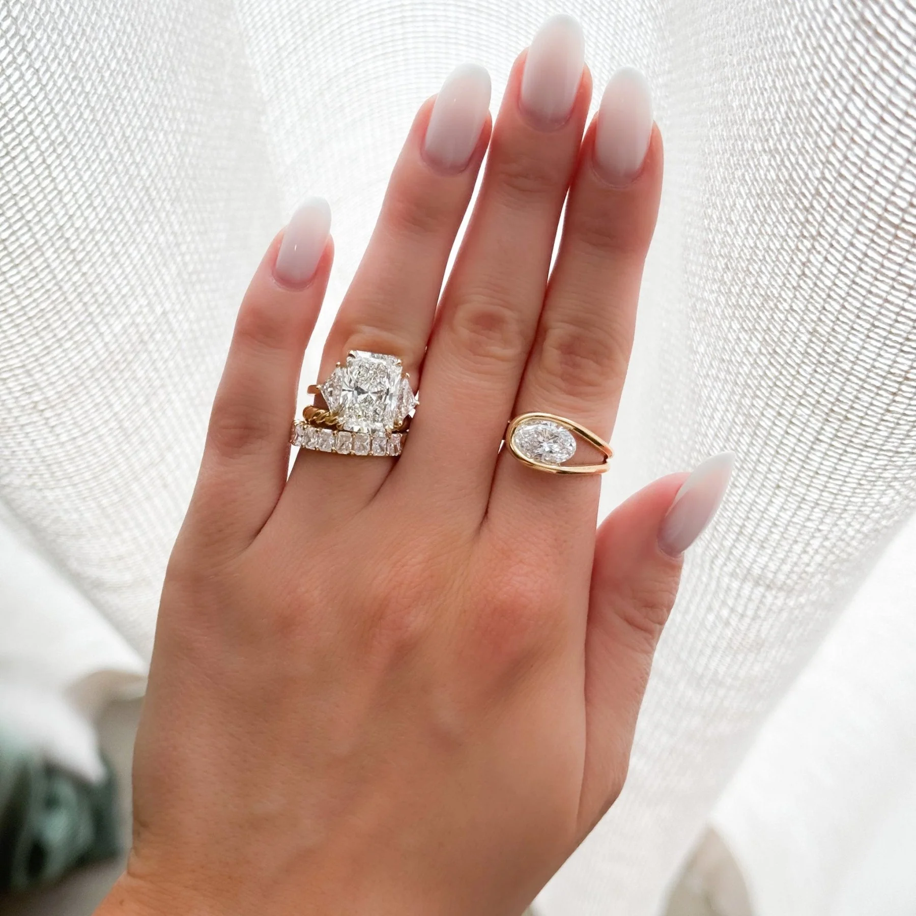 Three Stone Engagement Ring with Shield Side Stones and an Elongated Radiant cut Diamond - Image 2