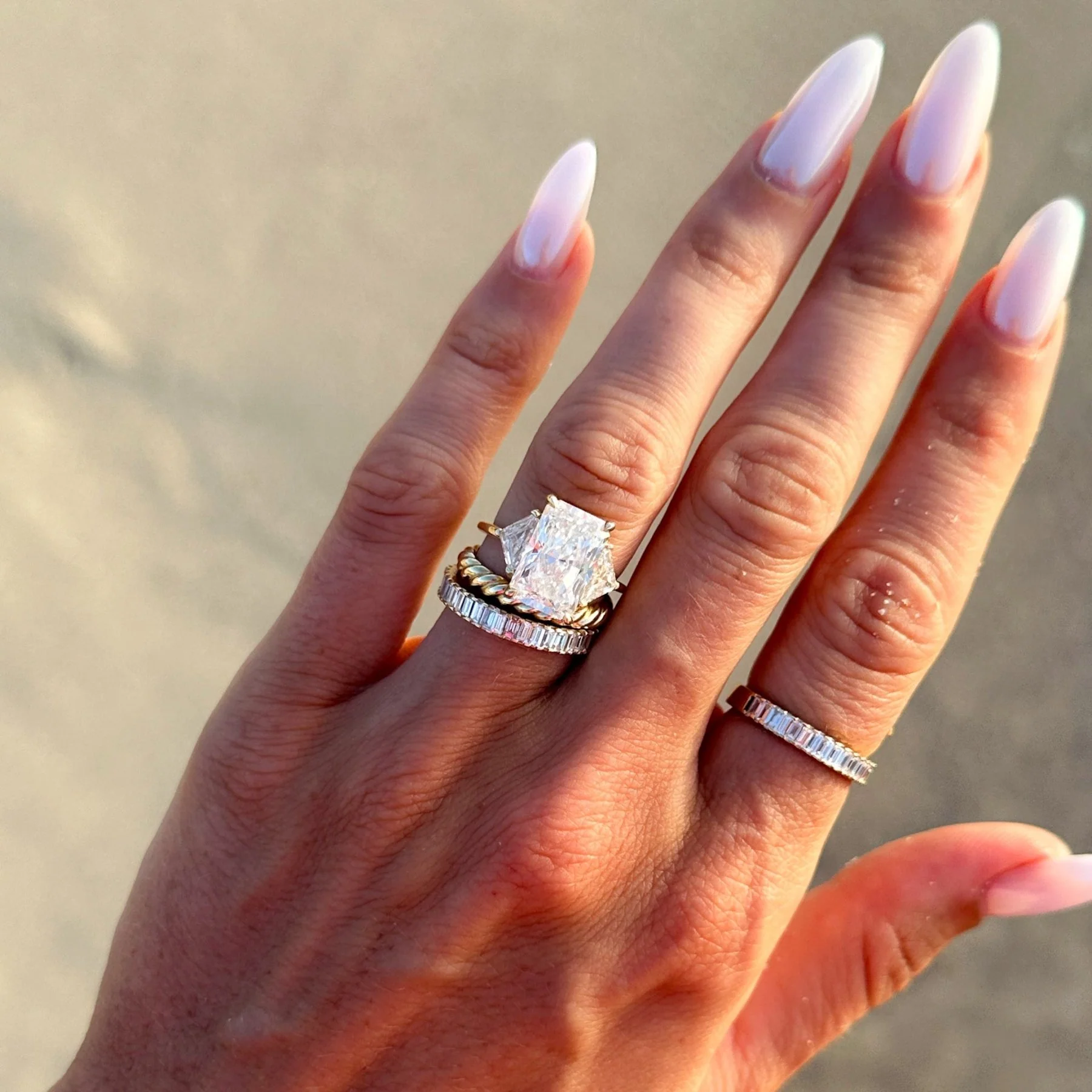 Three Stone Engagement Ring with Shield Side Stones and an Elongated Radiant cut Diamond - Image 7