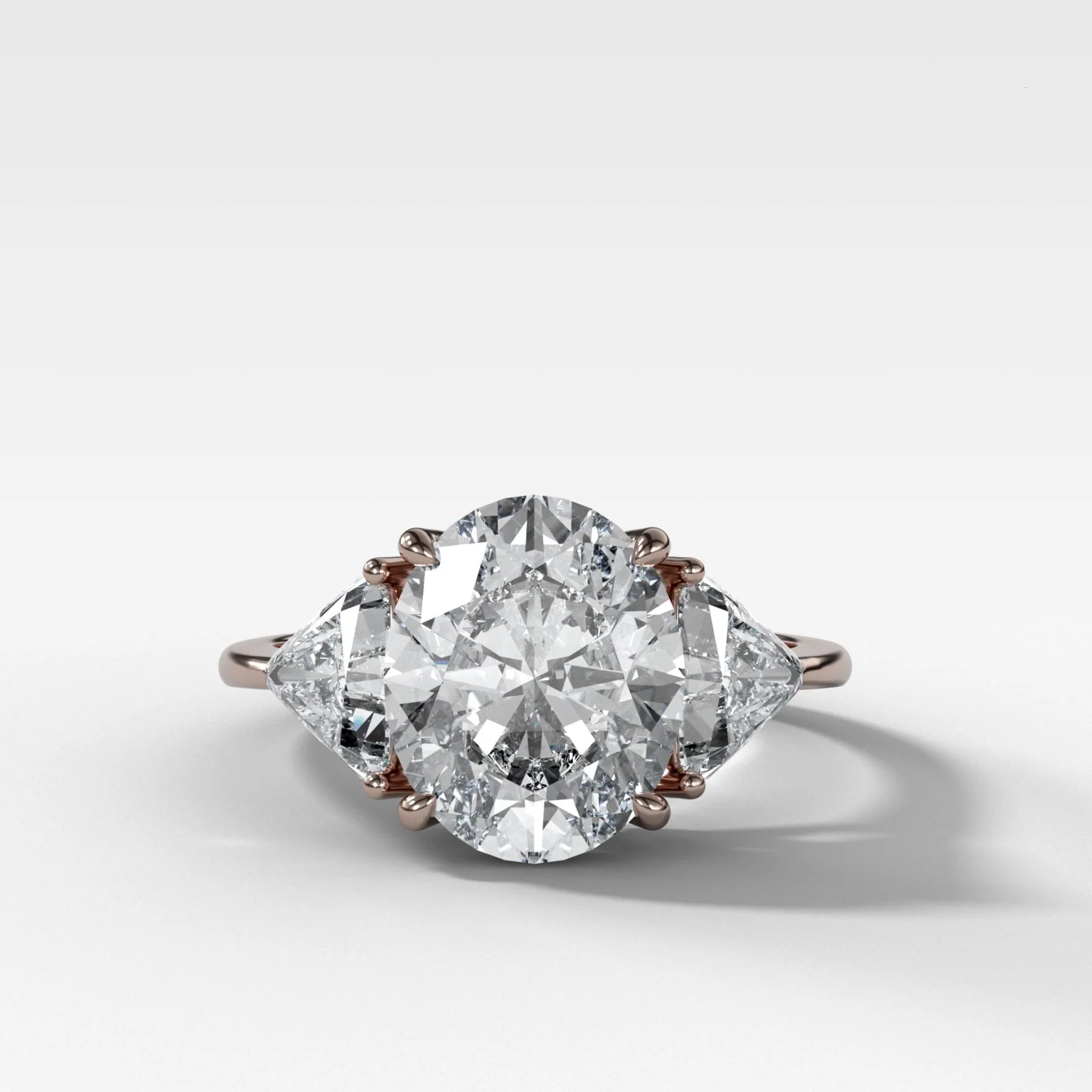 Three Stone Engagement Ring with Shield Side Stones and an Oval cut Diamond - Image 3