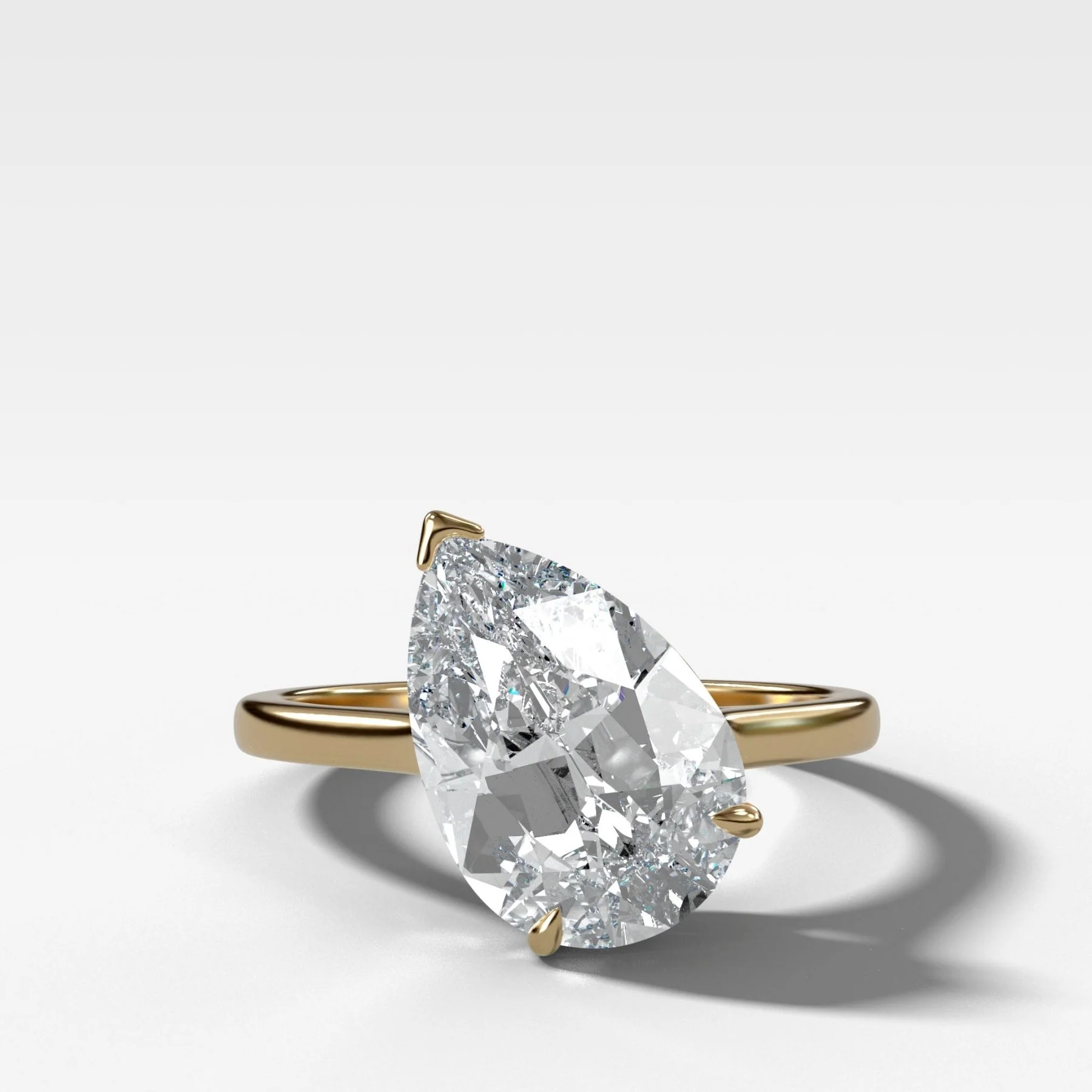 Tilted Thin + Simple Engagement Ring with 3.00ct Lab Grown Pear Cut Diamond