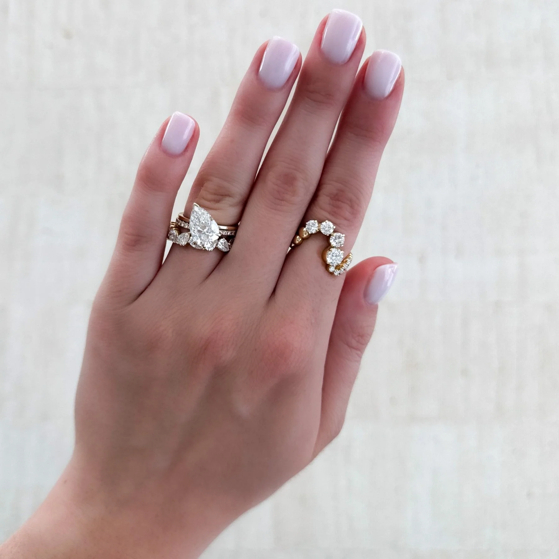 Tilted Thin + Simple Solitaire Engagement Ring With Pear Cut Diamond - Image 4