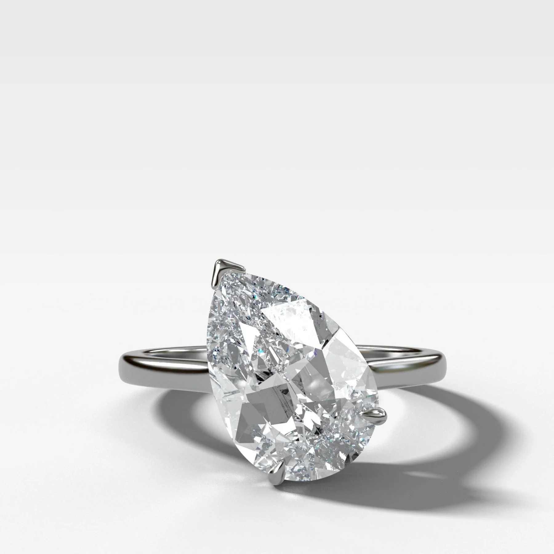 Tilted Thin + Simple Solitaire Engagement Ring With Pear Cut Diamond - Image 5