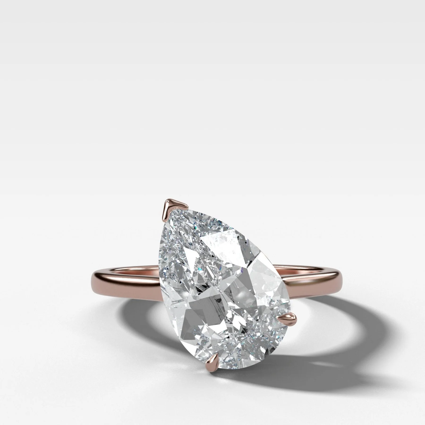Tilted Thin + Simple Solitaire Engagement Ring With Pear Cut Diamond - Image 6