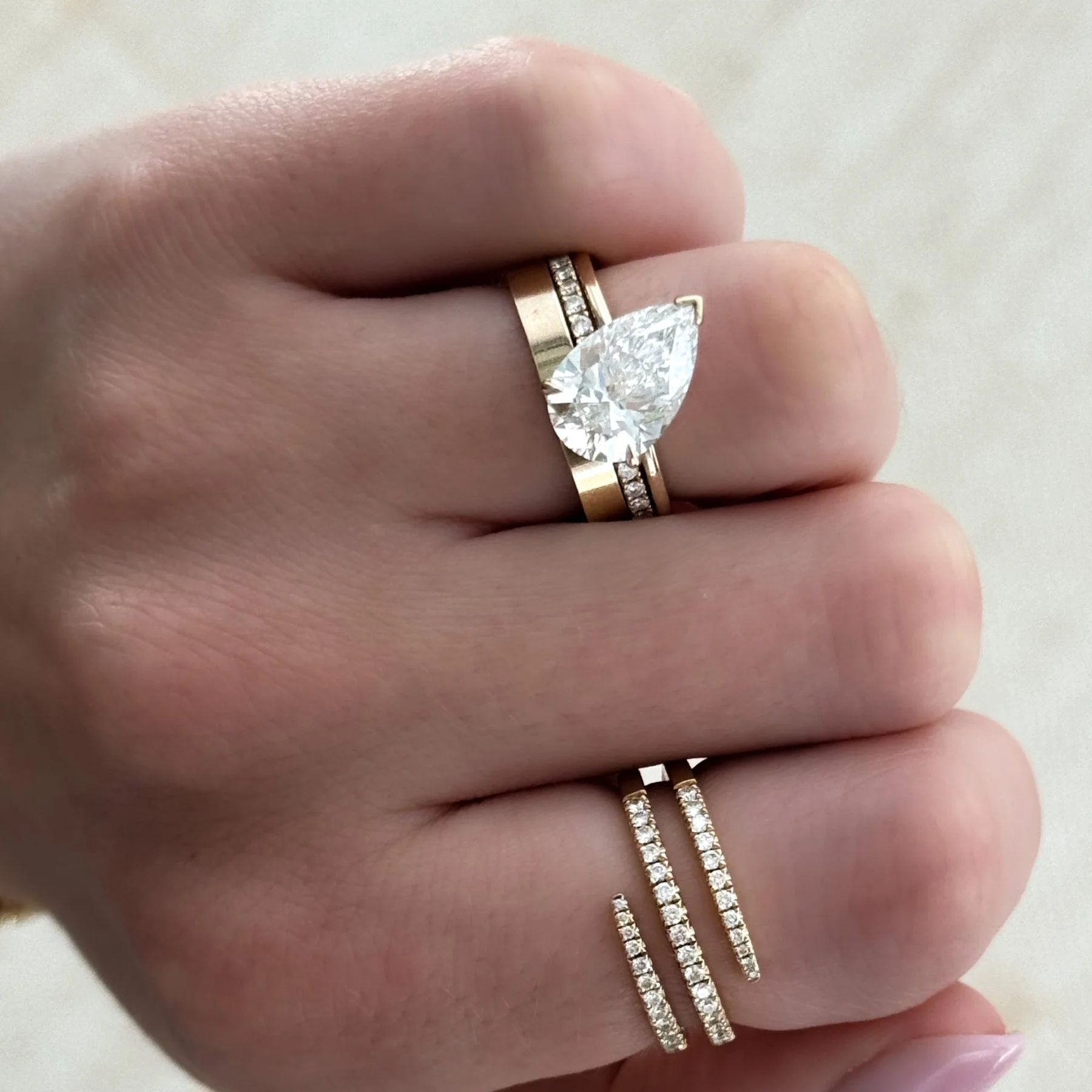 Tilted Thin + Simple Solitaire Engagement Ring With Pear Cut Diamond - Image 7